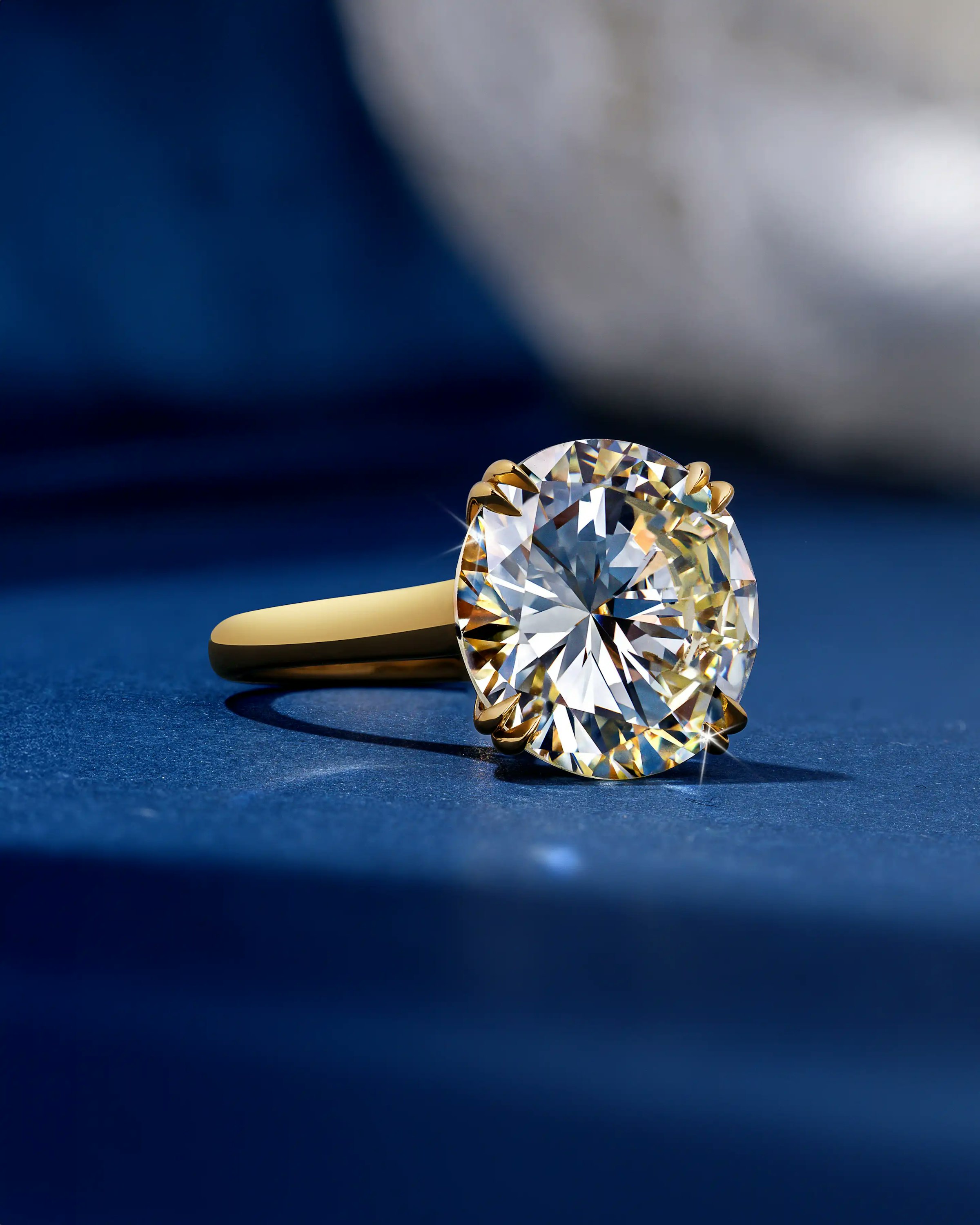 the ring, laid flat on a surface, facing the righthand side