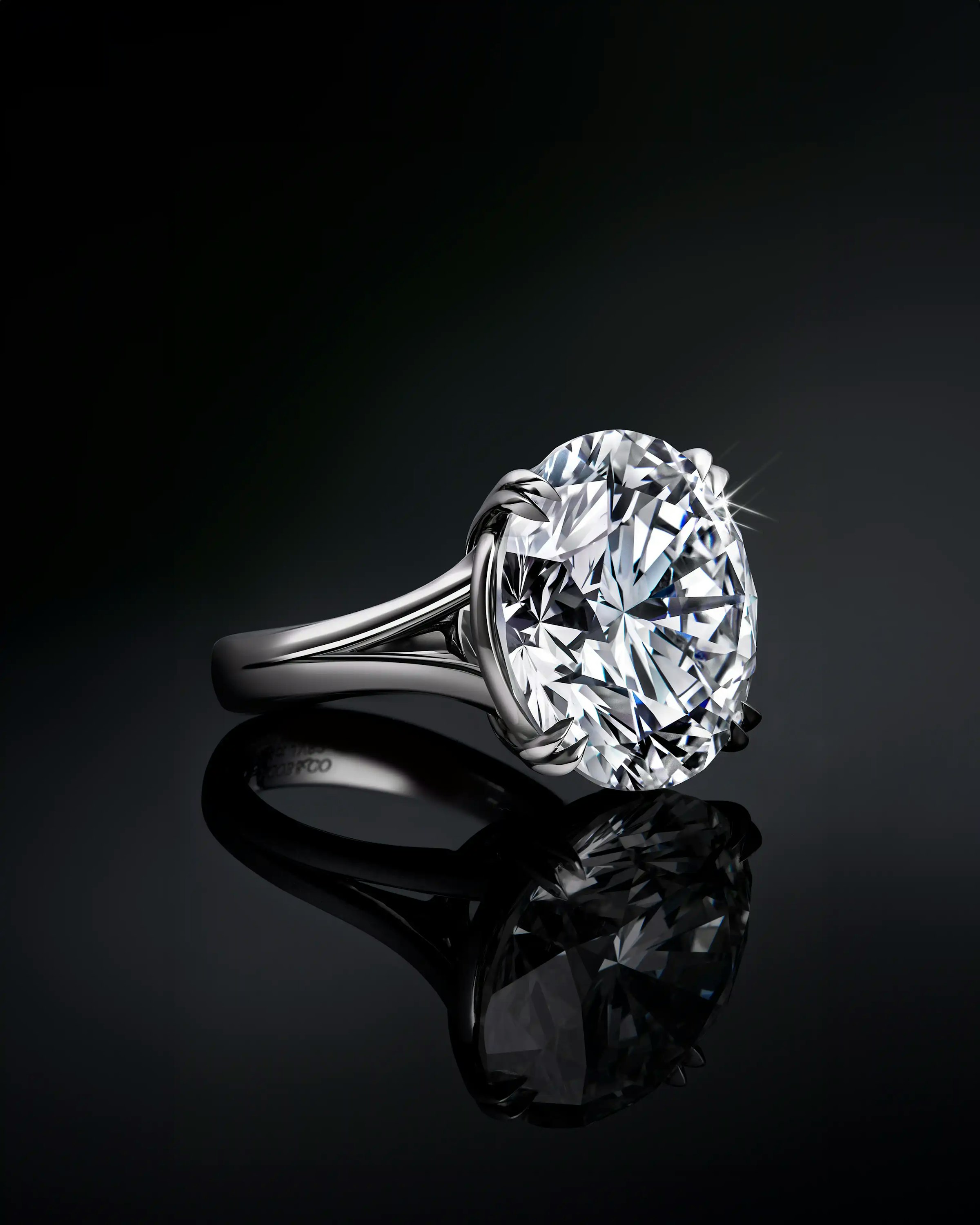 the ring is laid on a surface, facing towards the right.