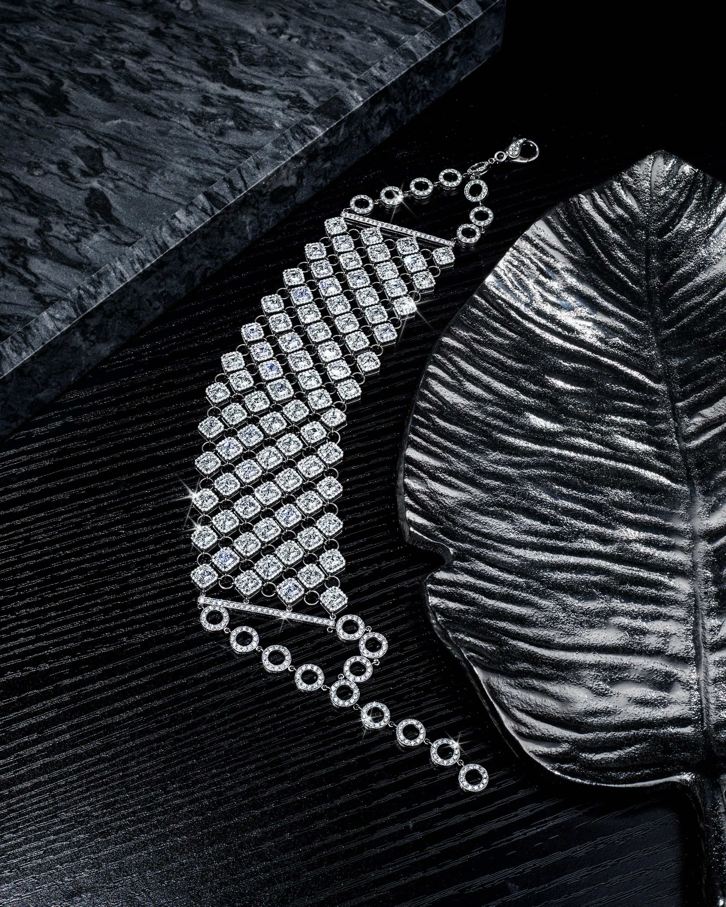 the infinia white diamond necklace, worn on a mannequin.