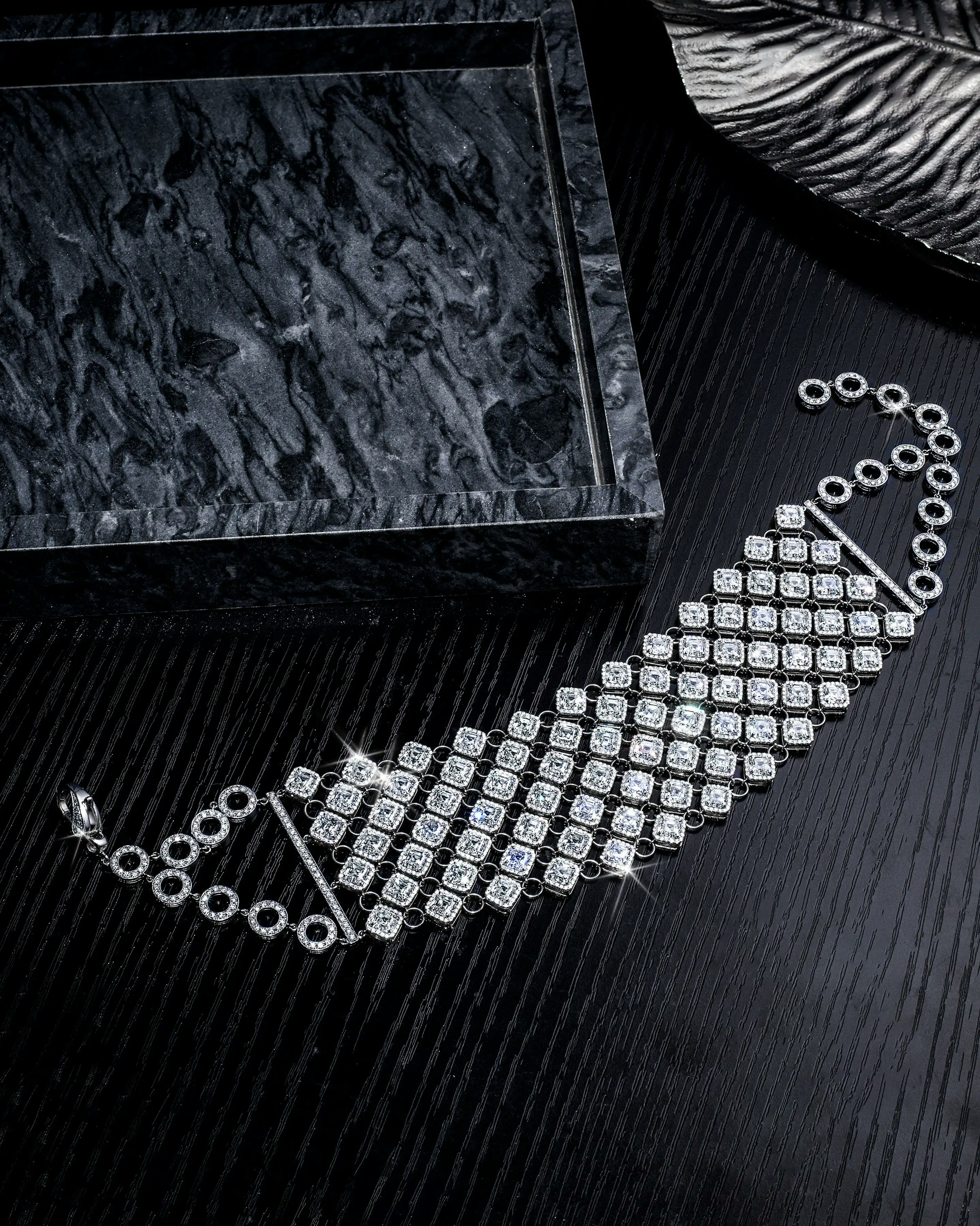 the infinia white diamond necklace, worn on a mannequin.