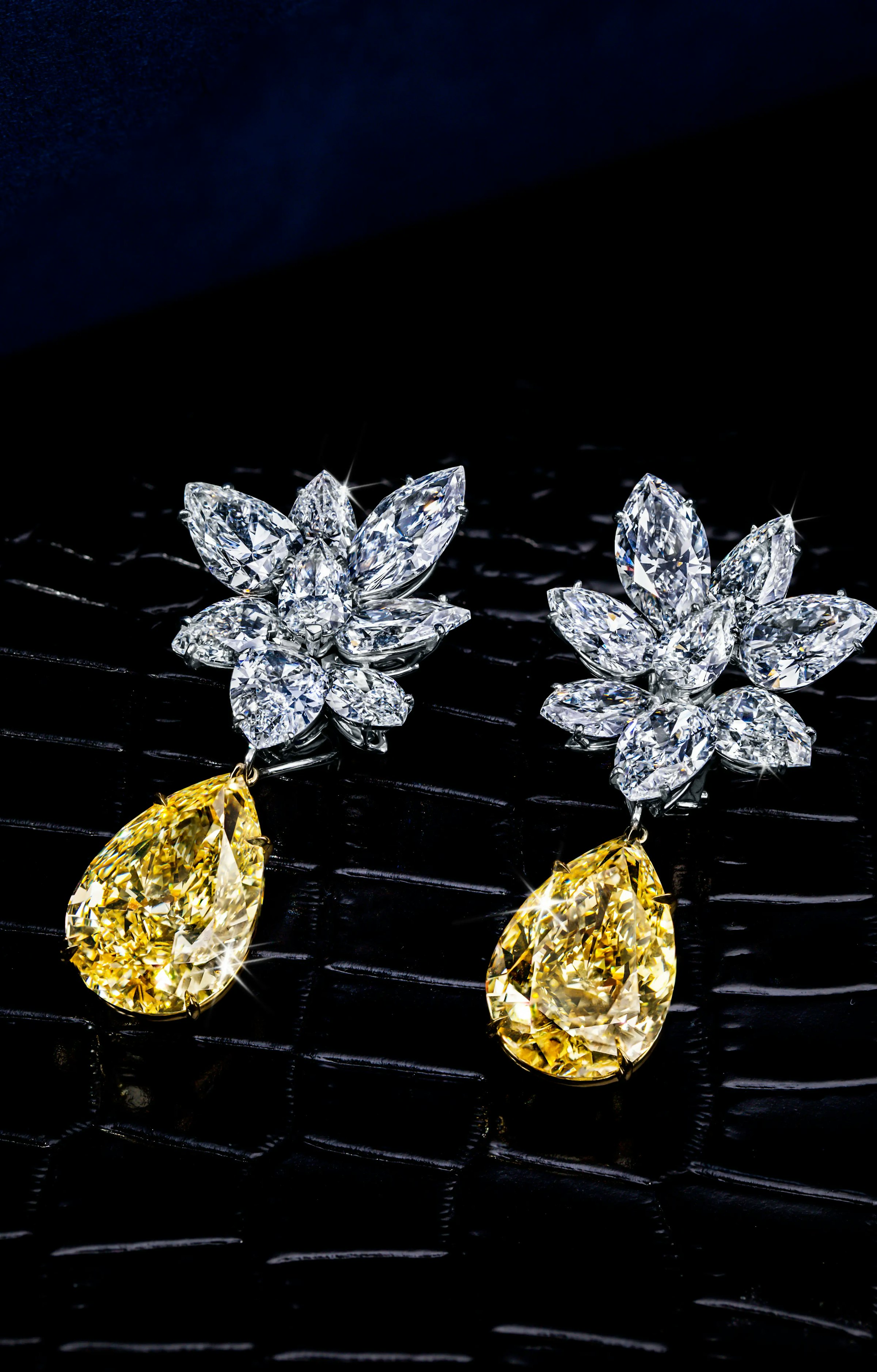 the yellow garden earrings, laid flat on a surface.