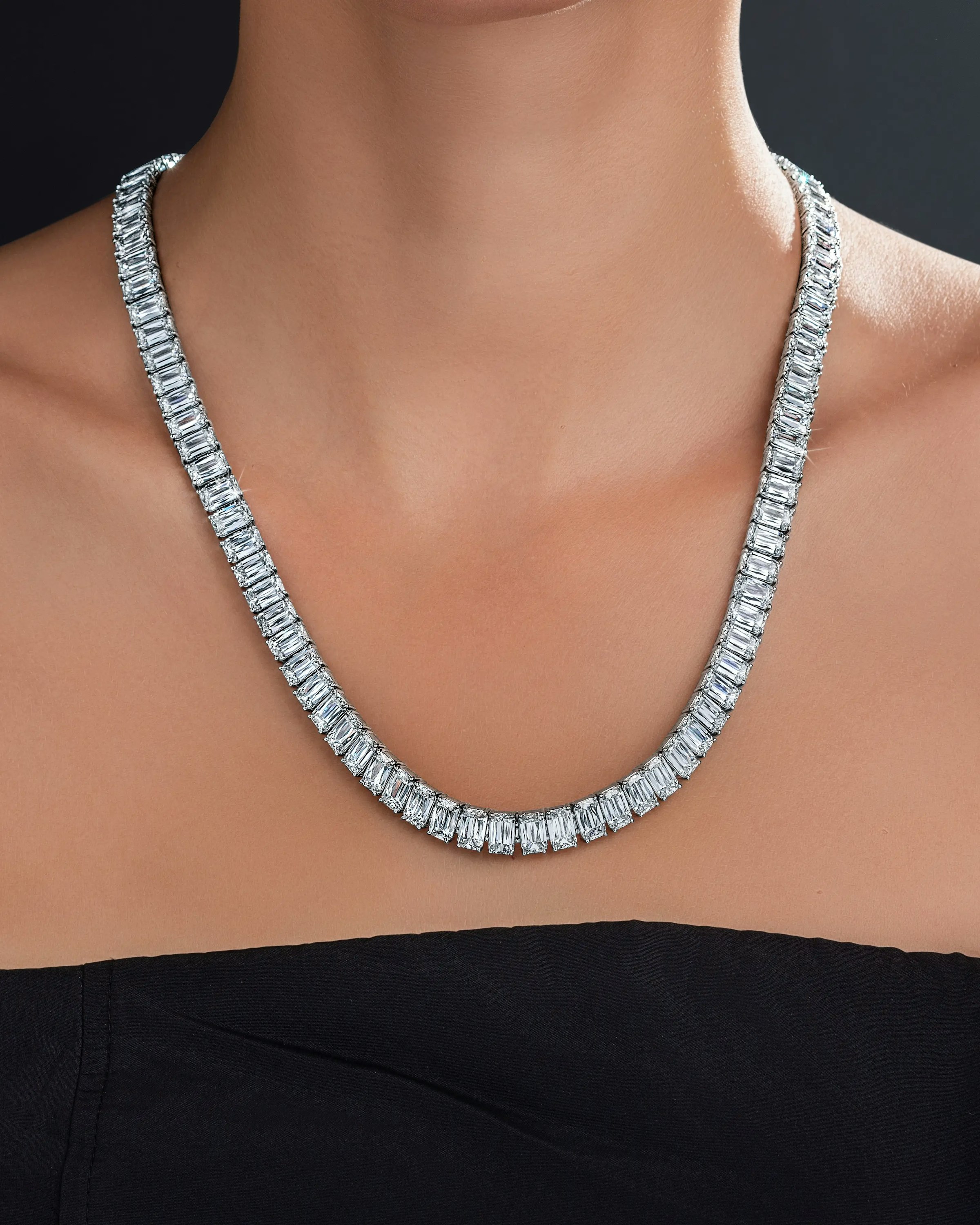 a model wears the ashoka diamond tennis necklace.