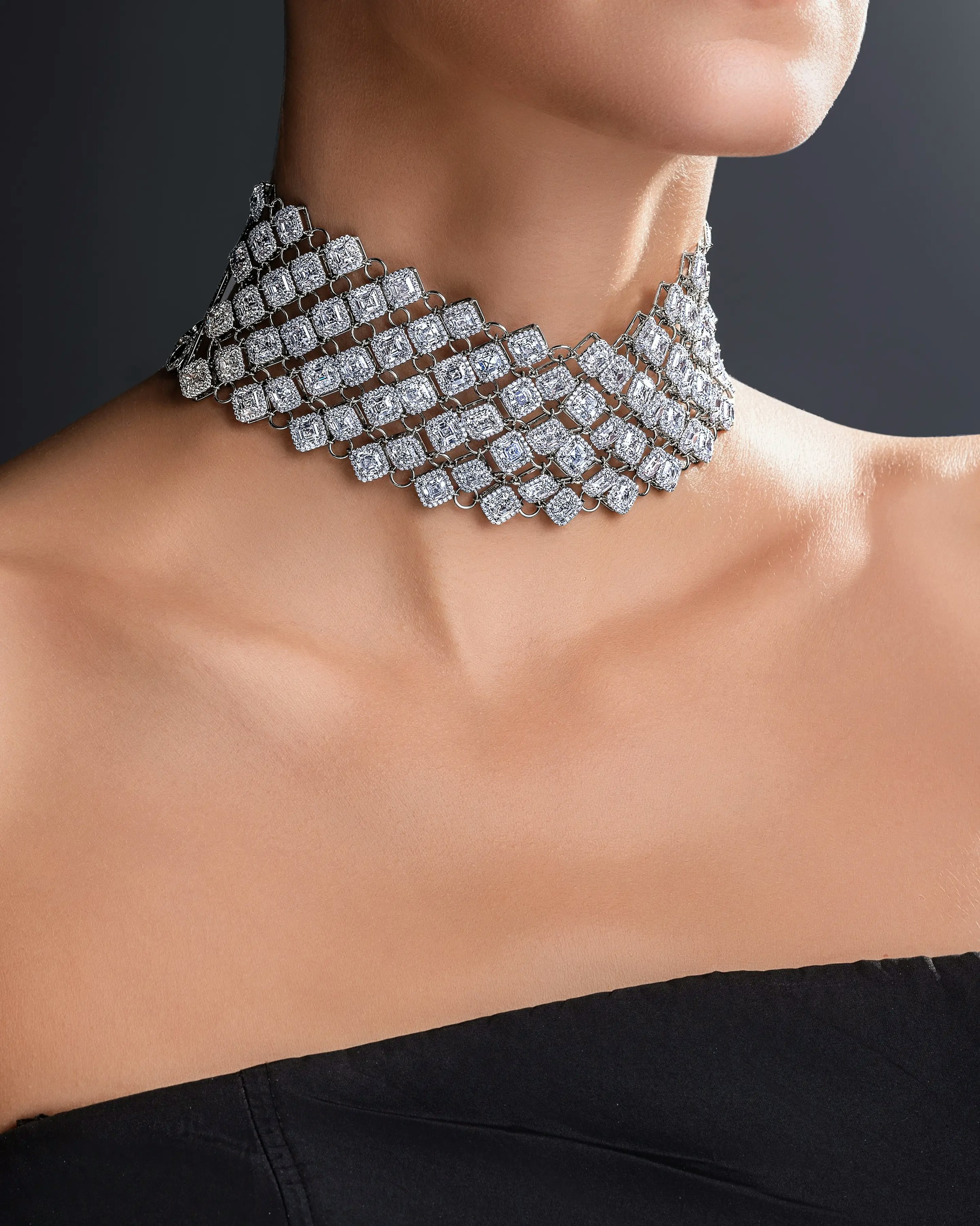 a model wears the infinia white diamond neckalce.