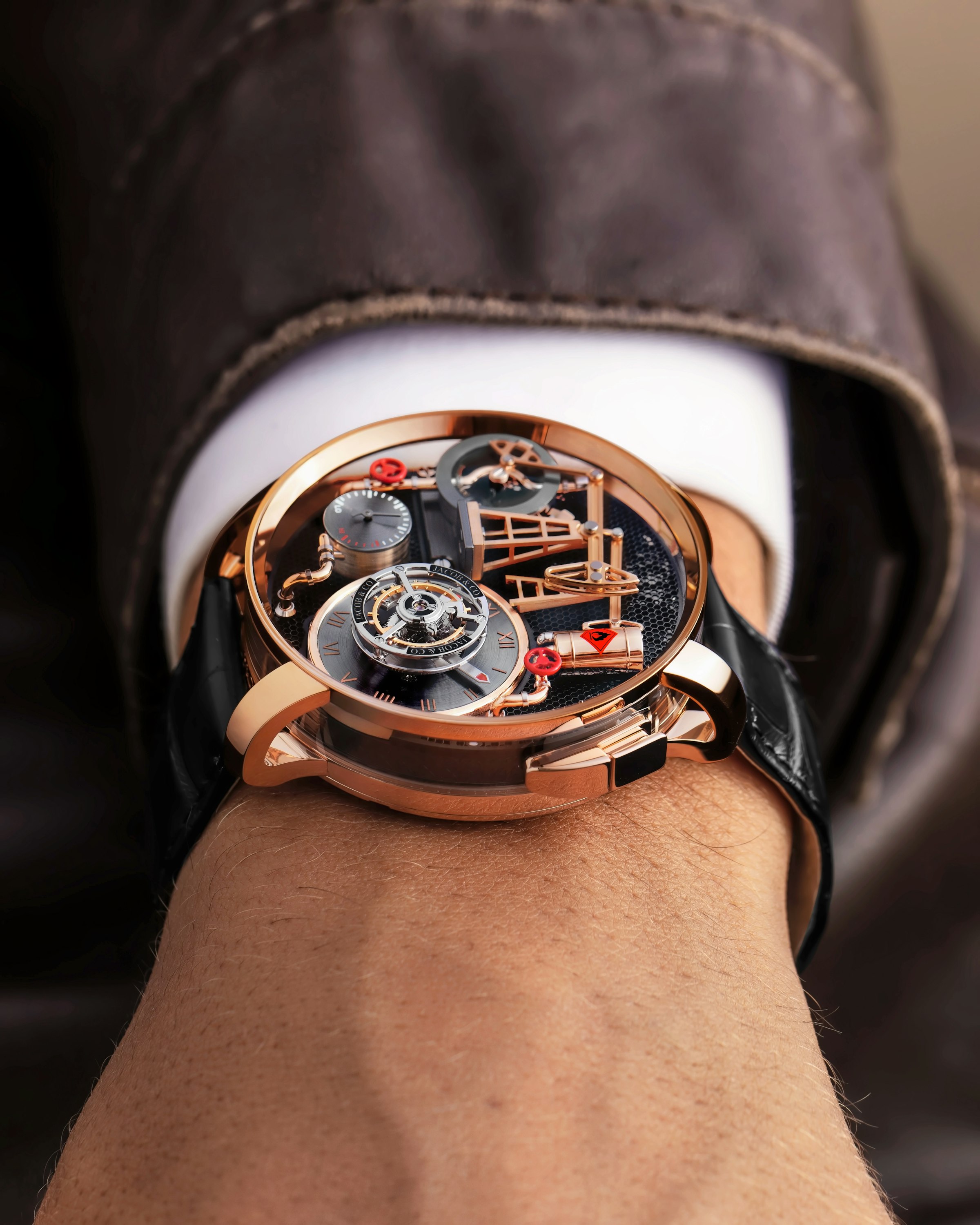 An angled view of the Oil Pump 44mm worn on the wrist