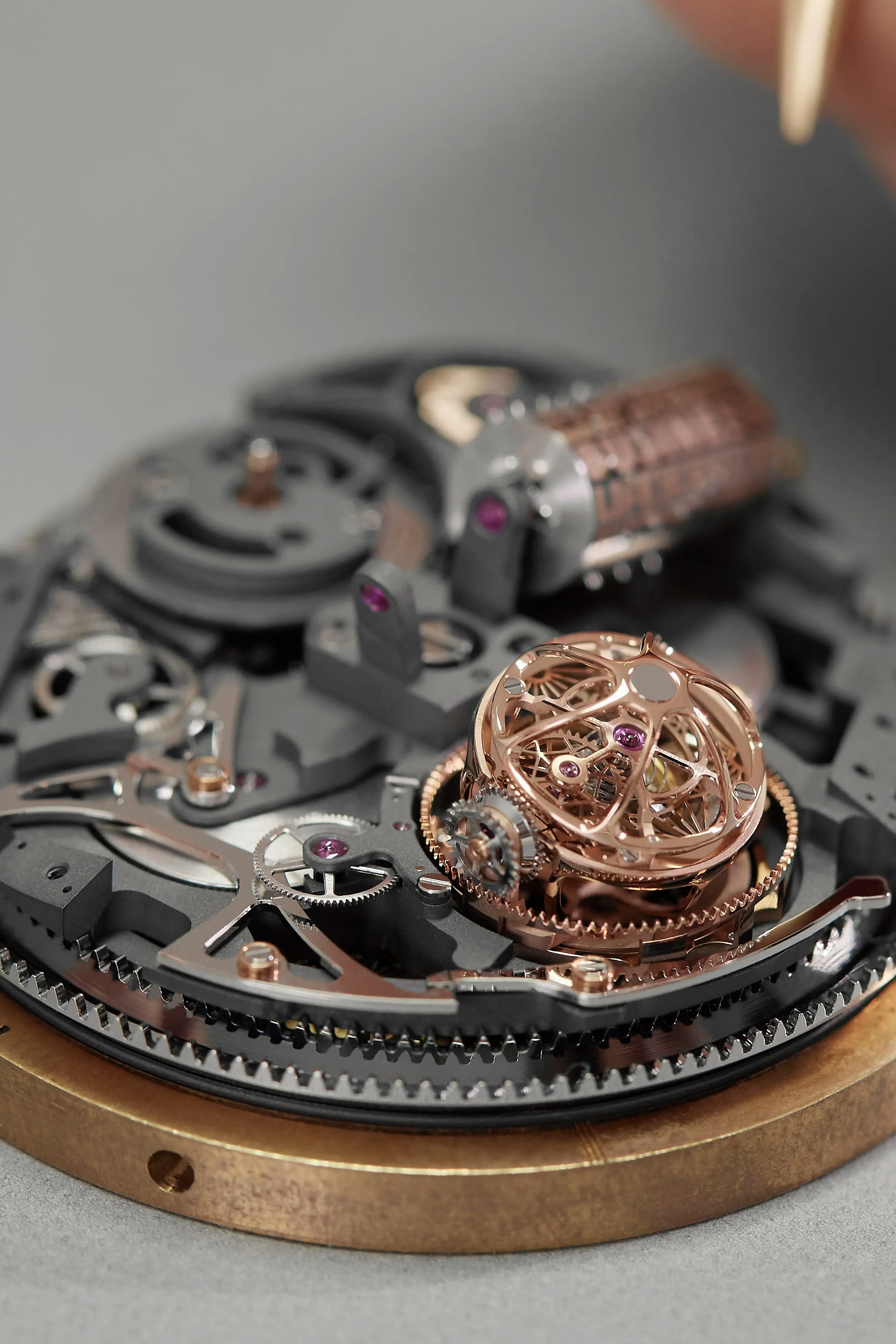 A close-up image of a tourbillon installed on a watch movement