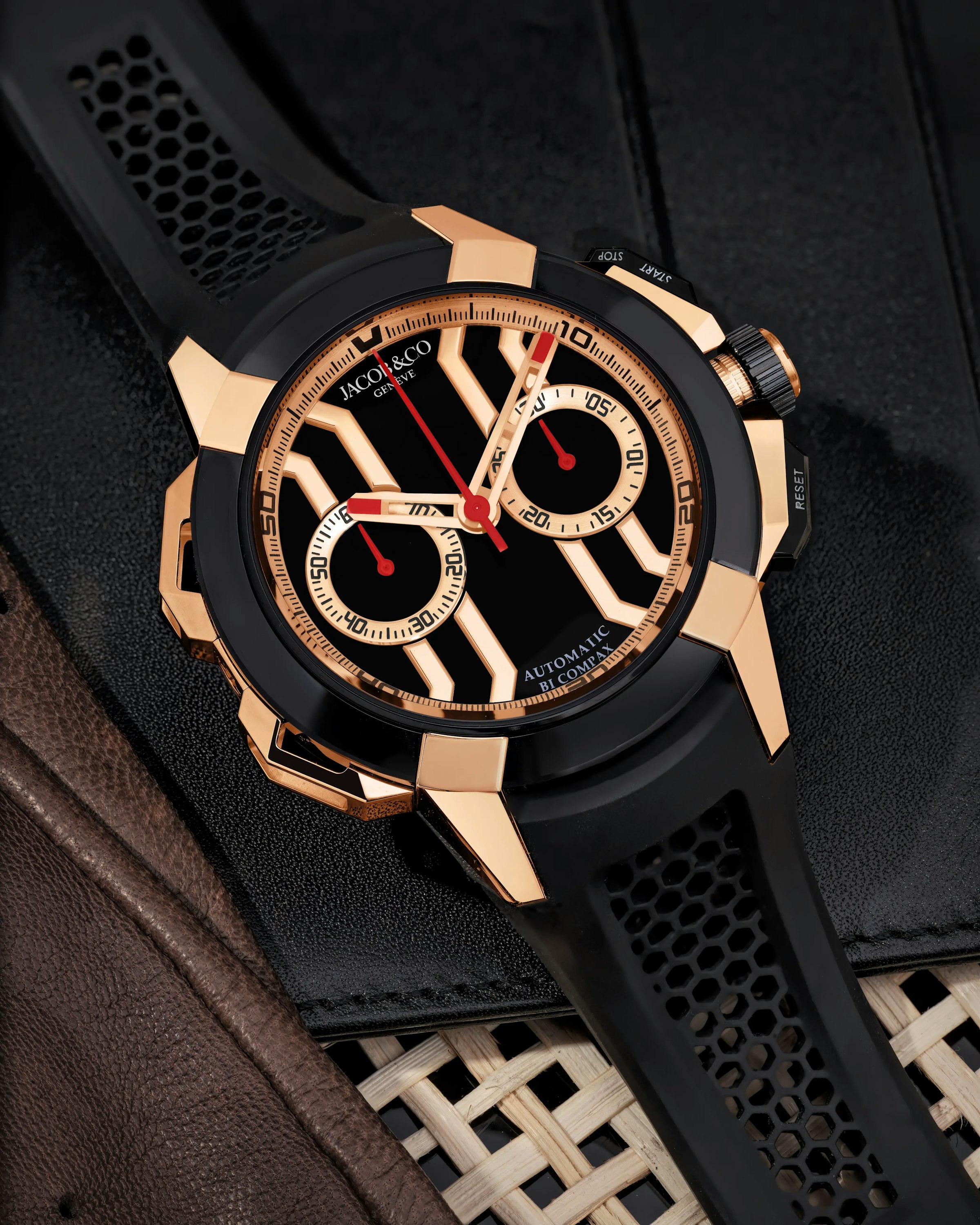 An image of the Epic X Chrono 44mm black and gold watch laid flat on a surface
