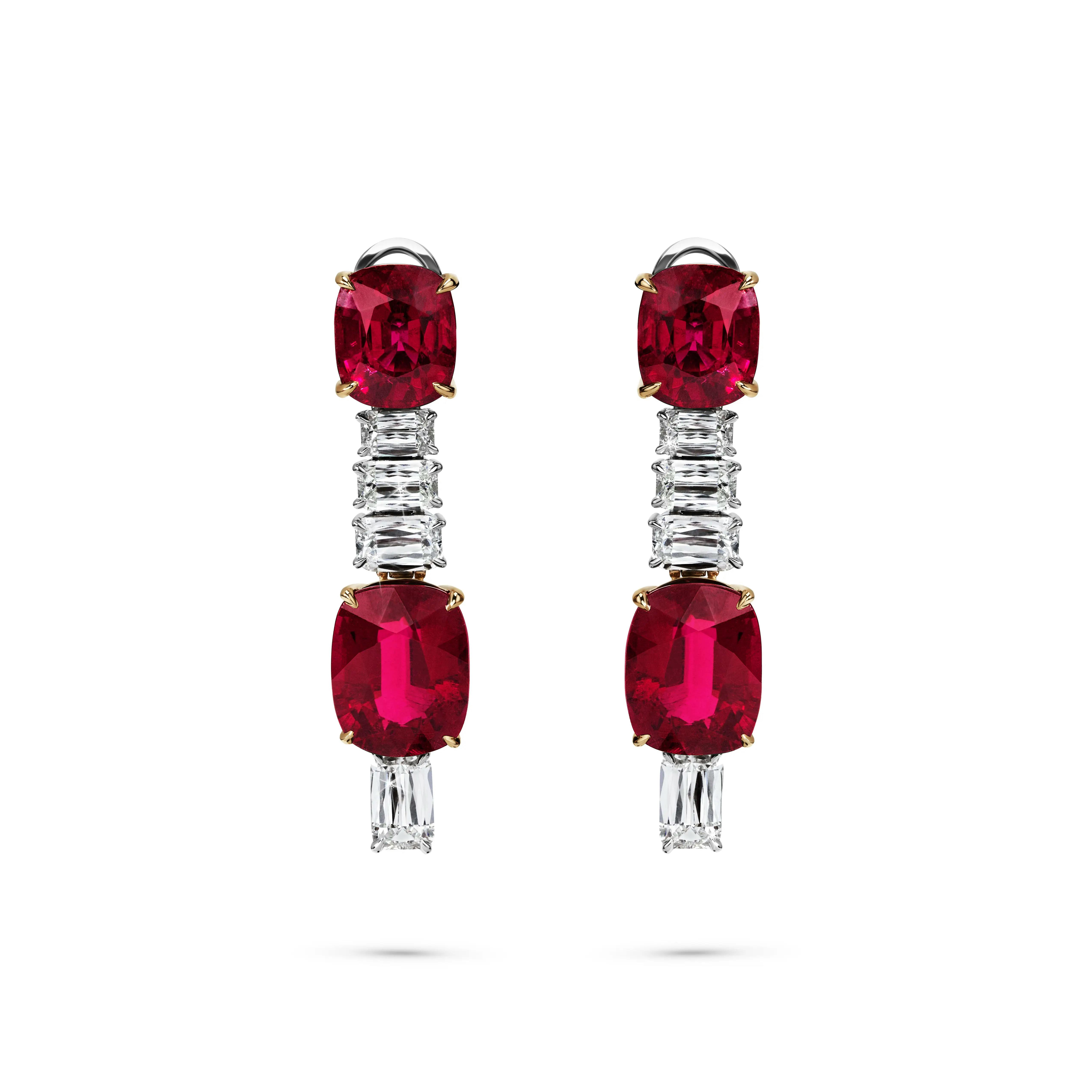 the crimson cascade earrings. two rubellite gems with three ashoka-cut diamongs in between them. the tail end of the earrings contains another ashoka diamond piece.