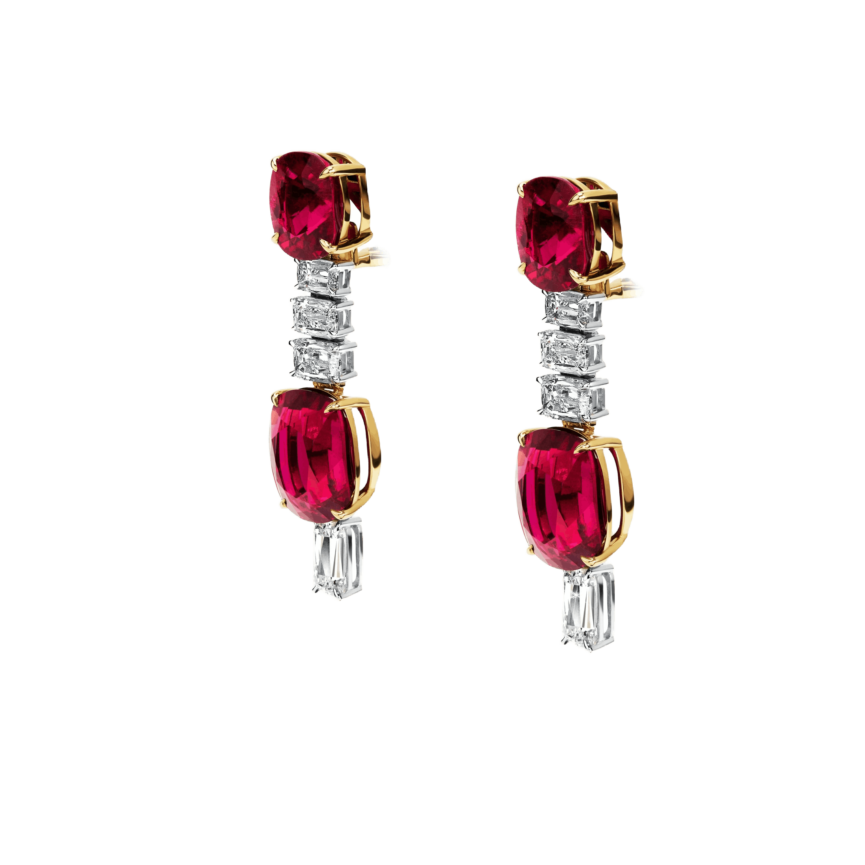 the earrings, facing to the left of the viewer.
