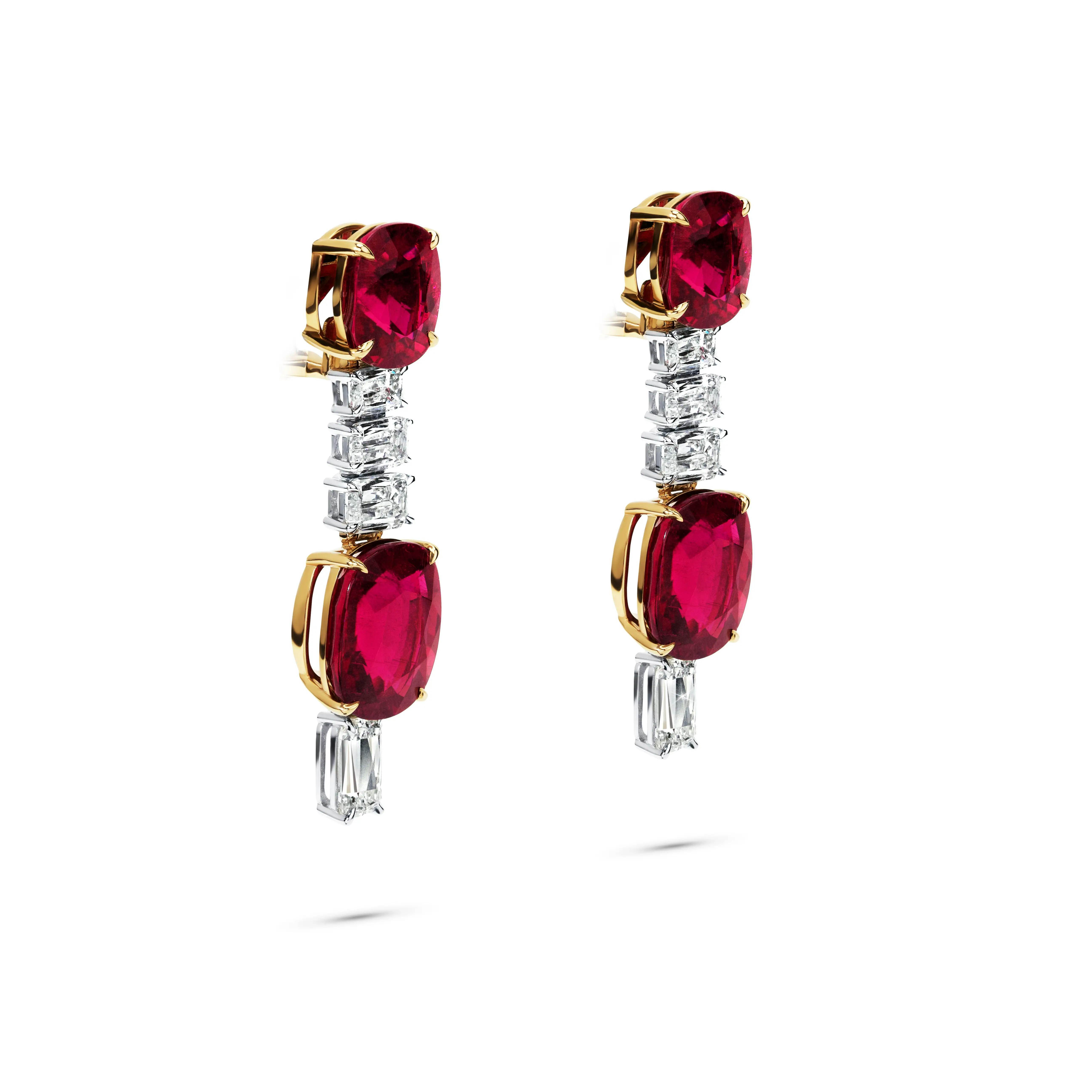 the earrings, facing to the right of the viewer.