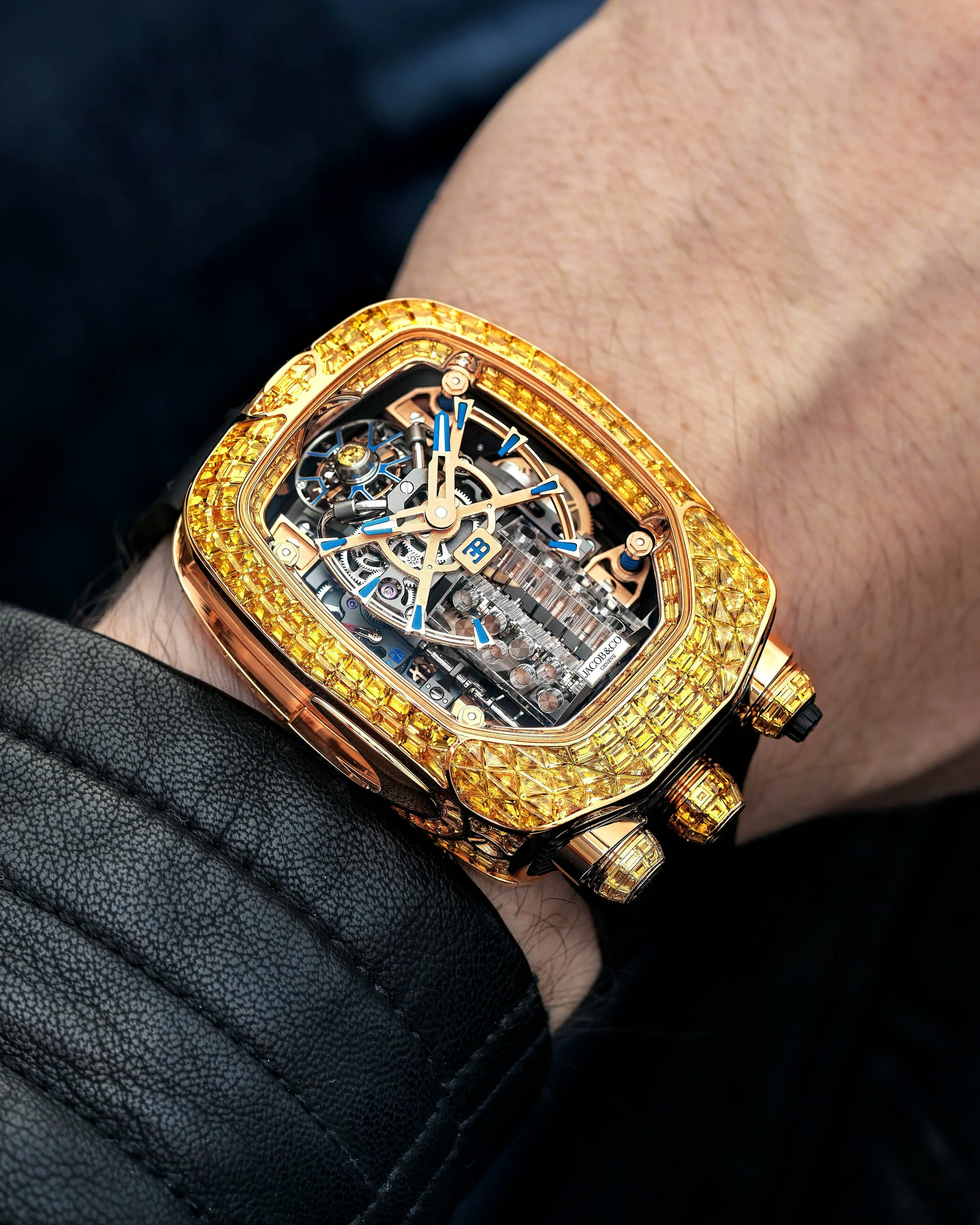 the yellow sapphire Bugatti Chiron tourbillion watch, worn on the left wrist