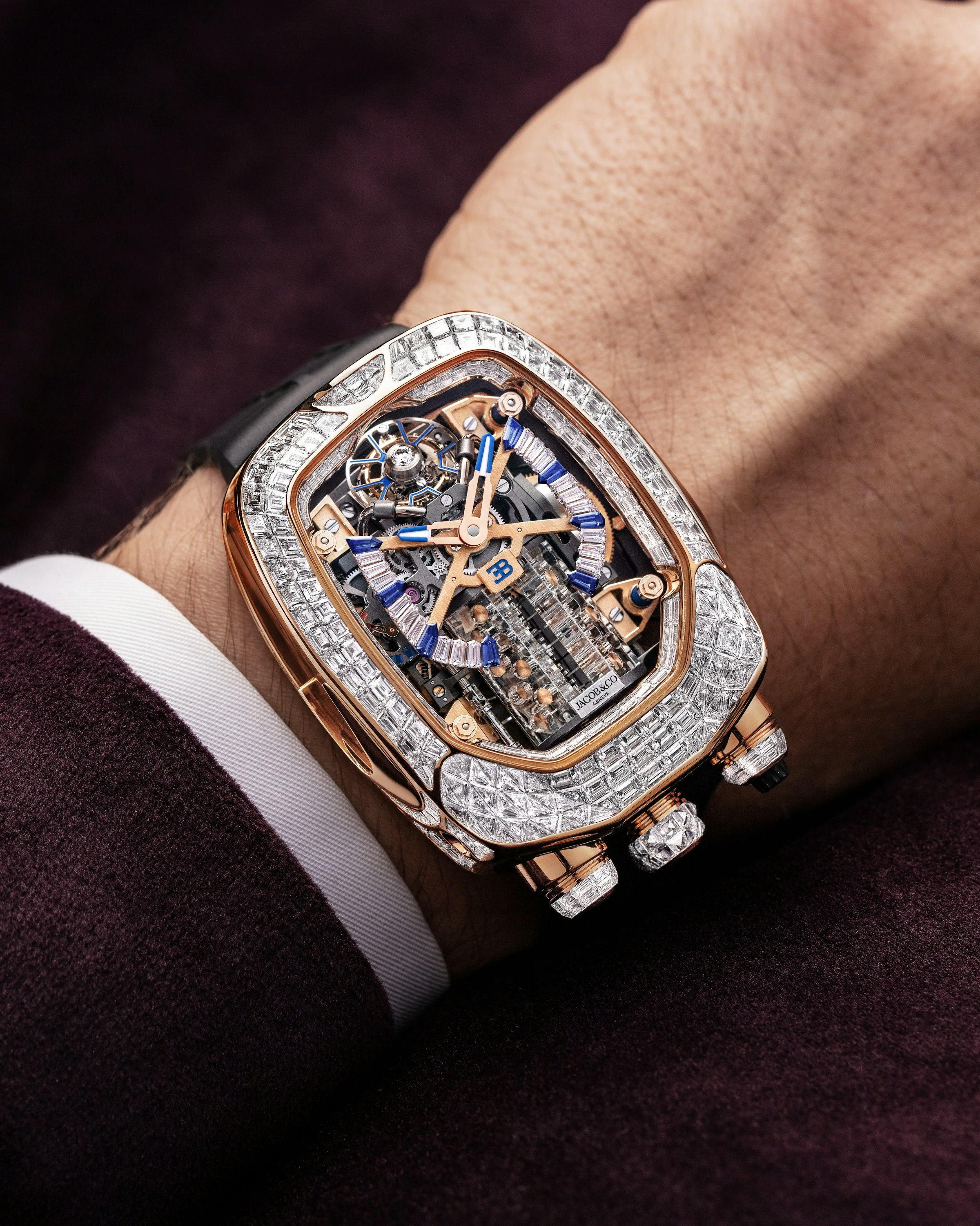 the rose gold Bugatti Chiron tourbillon watch, worn on the left wrist