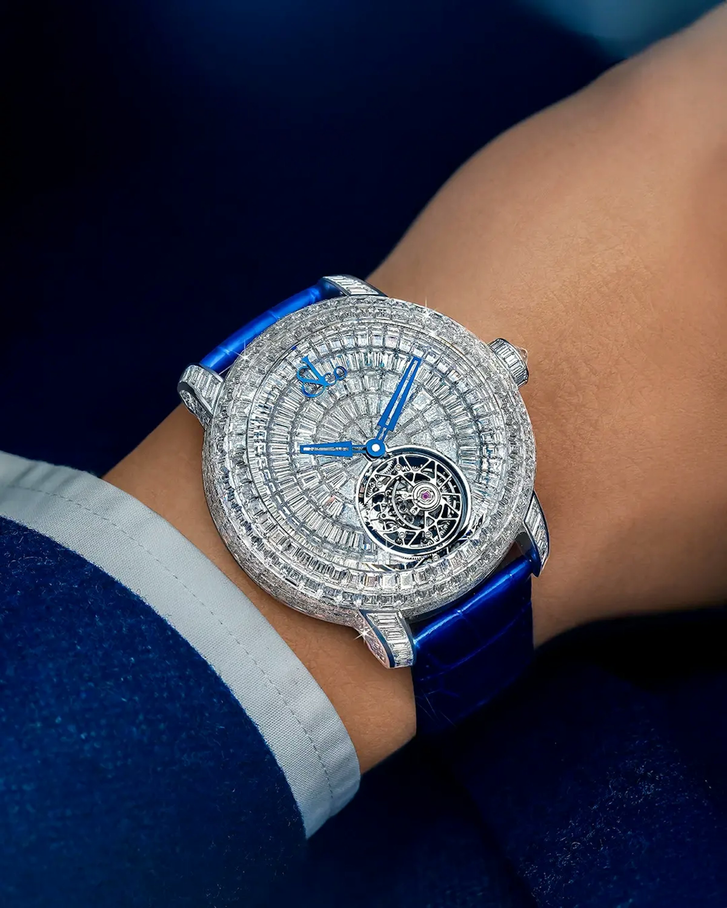 the diamond caviar tourbillon watch, worn on the left wrist