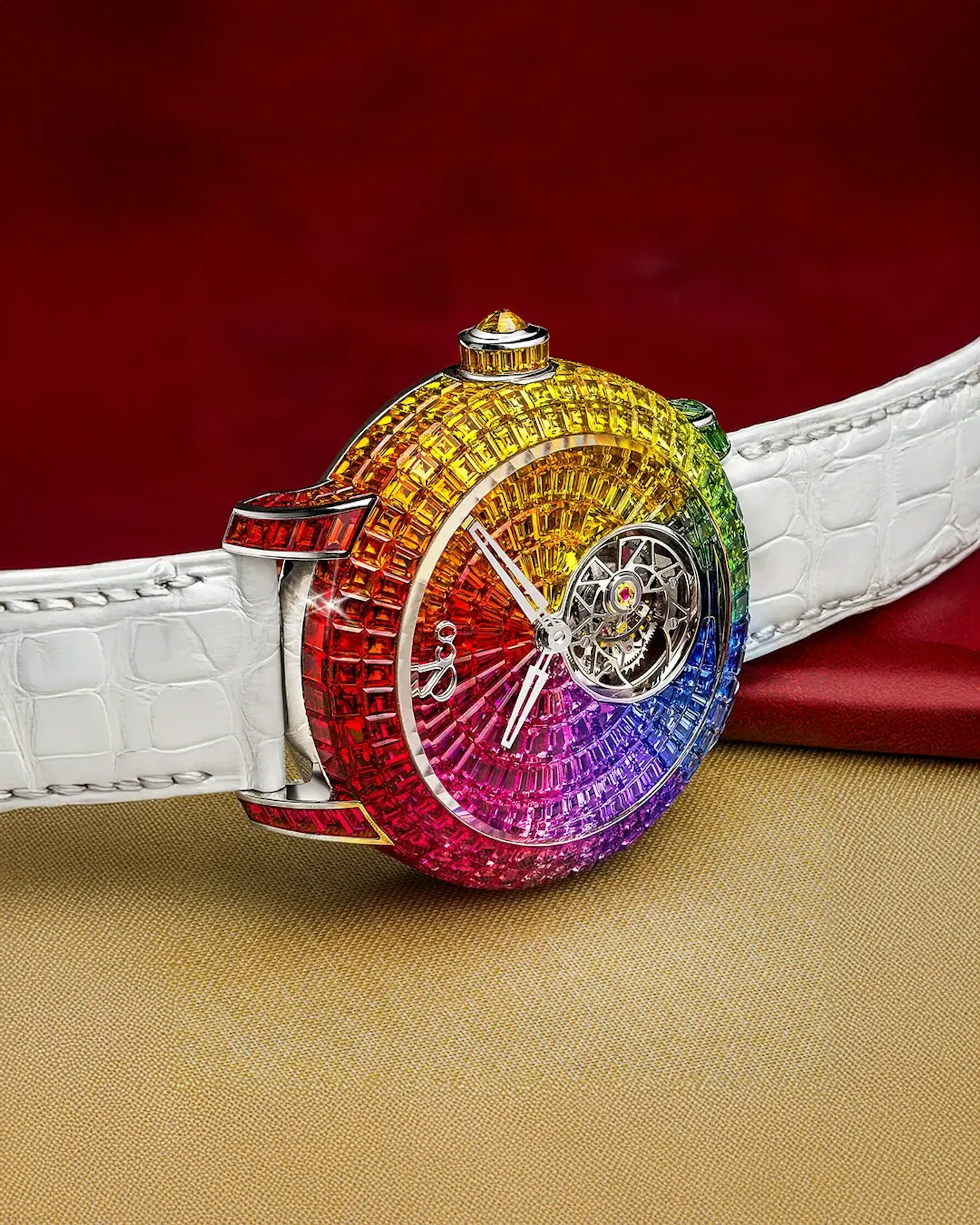 the caviar tourbillon rainbow watch, laid sideways on a flat surface