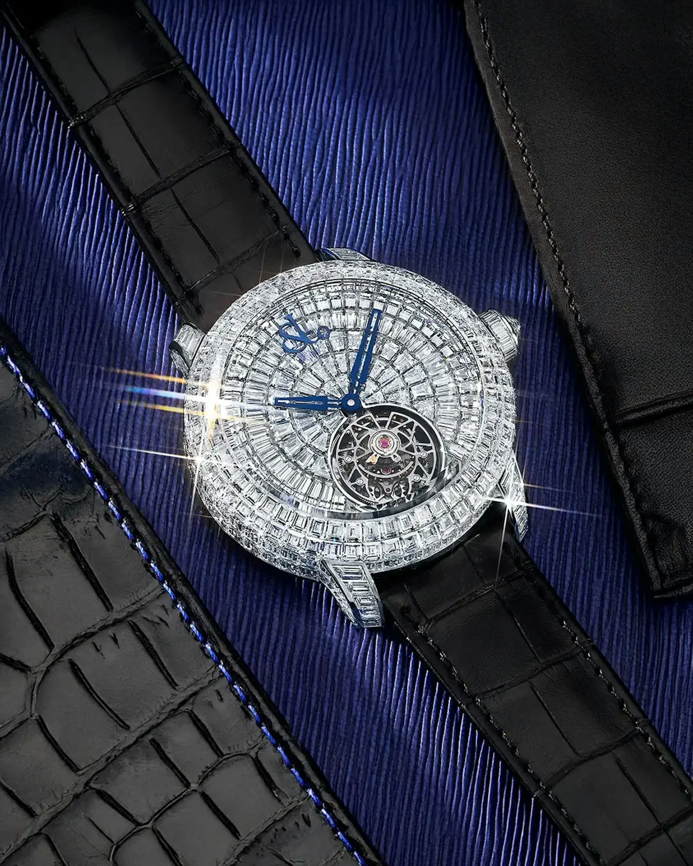The caviar tourbillon watch, laid flat on a surface