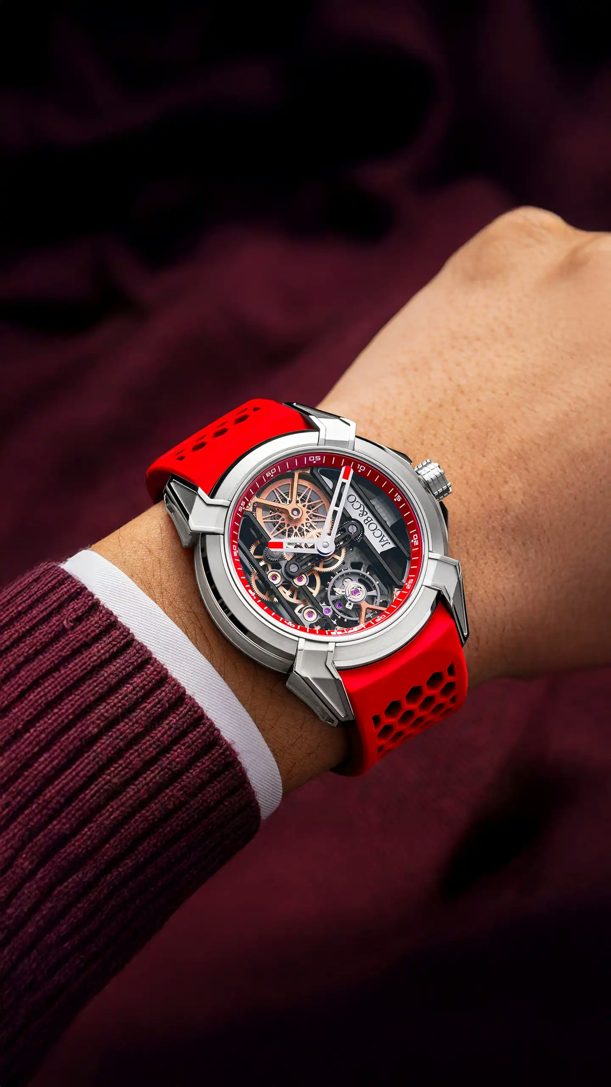 the red epic x bridges, worn on the left wrist.