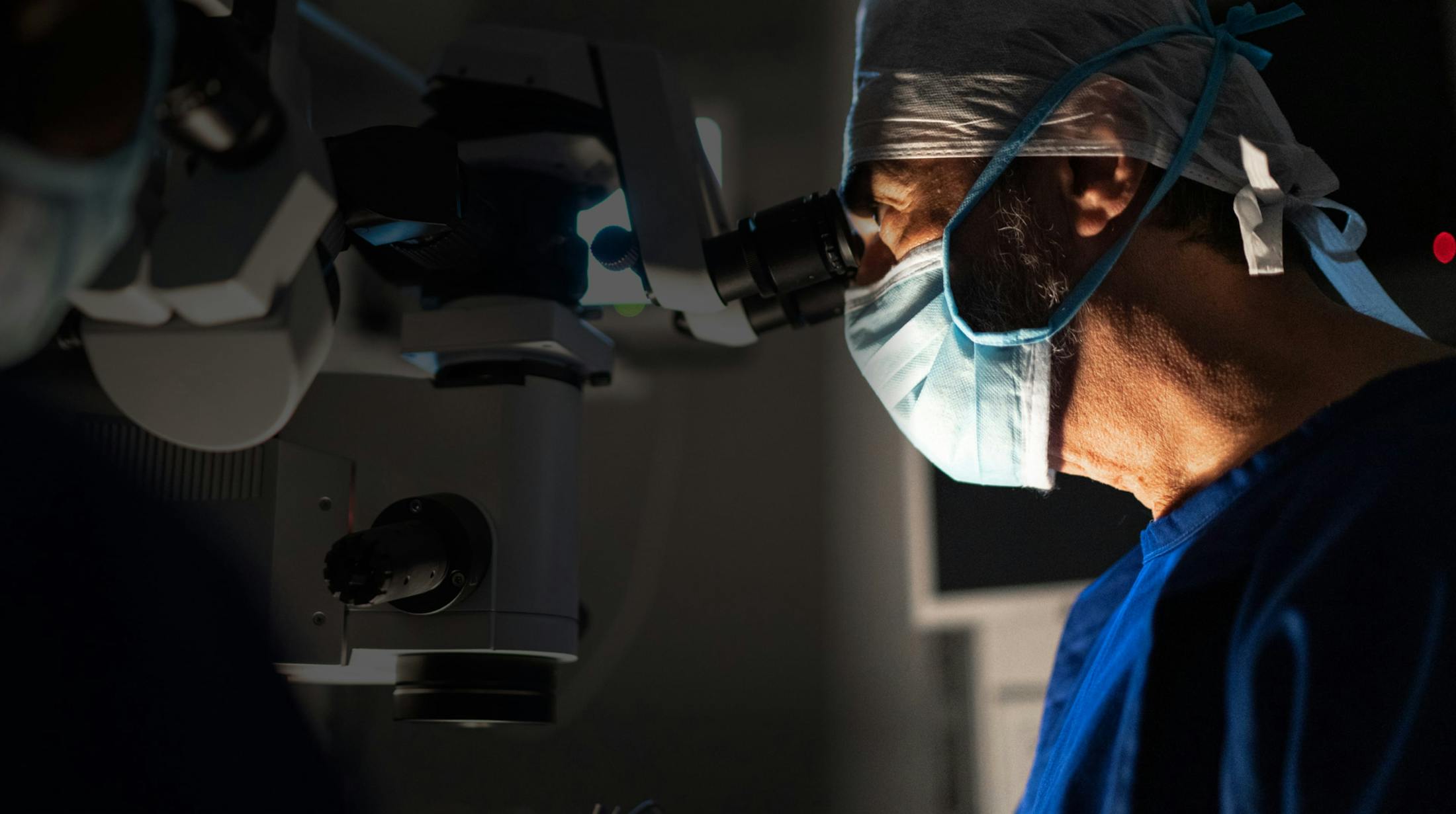 Eye doctor performing eye exam