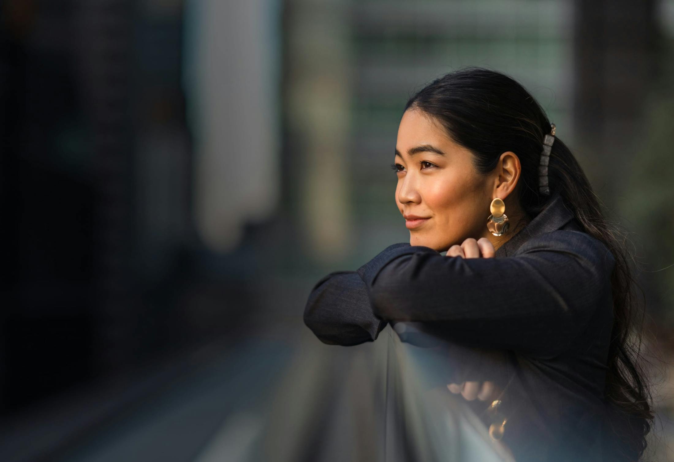 woman looking out into the city