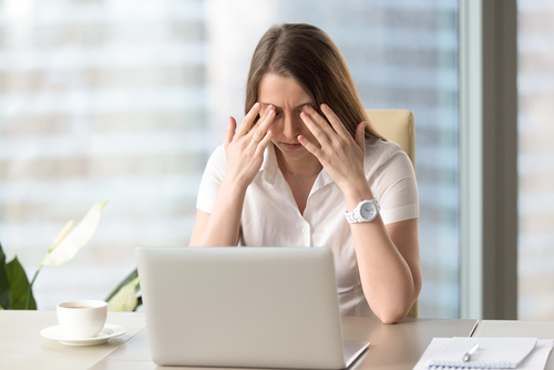 Woman suffering from dry eyes