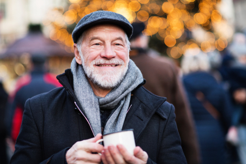 Older man with cataracts smiling