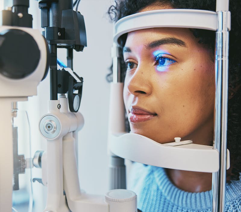 Woman receiving eye exam
