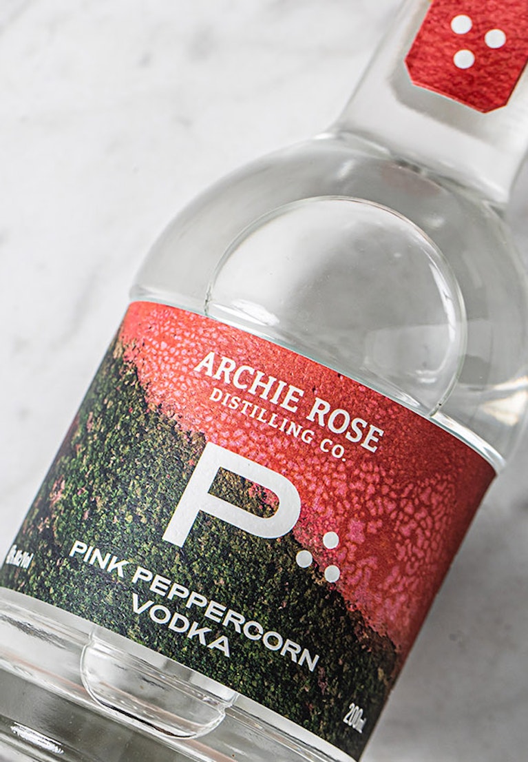 overhead-shot-of-archie-rose-pink-peppercorn-vodka-front-label