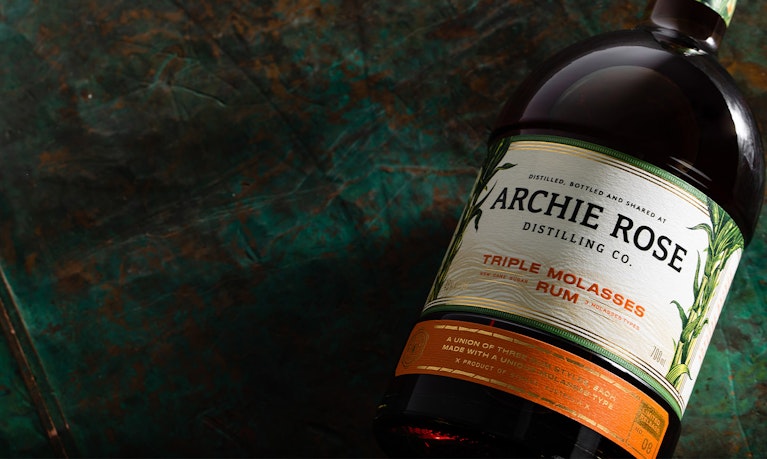 Overhead-view-of-front-of-Archie-Rose-Triple-Molasses-Rum-bottle