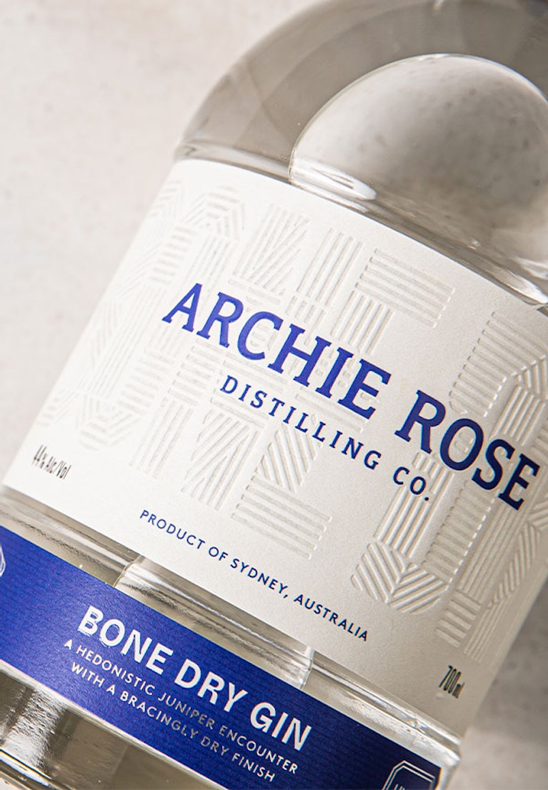 overhead-shot-of-archie-rose-bone-dry-gin-white-label-closeup