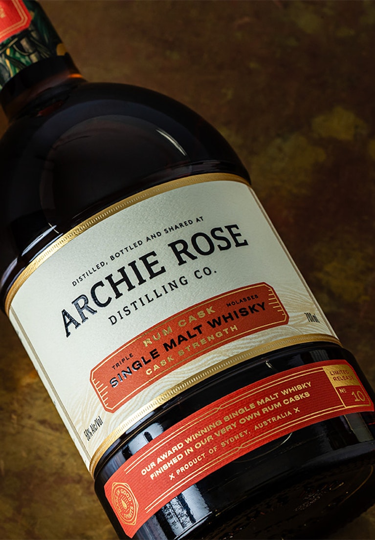 Overhead-view-of-front-of-Archie-Rose-Rum-Cask-Single-Malt-Whisky-Cask-Strength-bottle