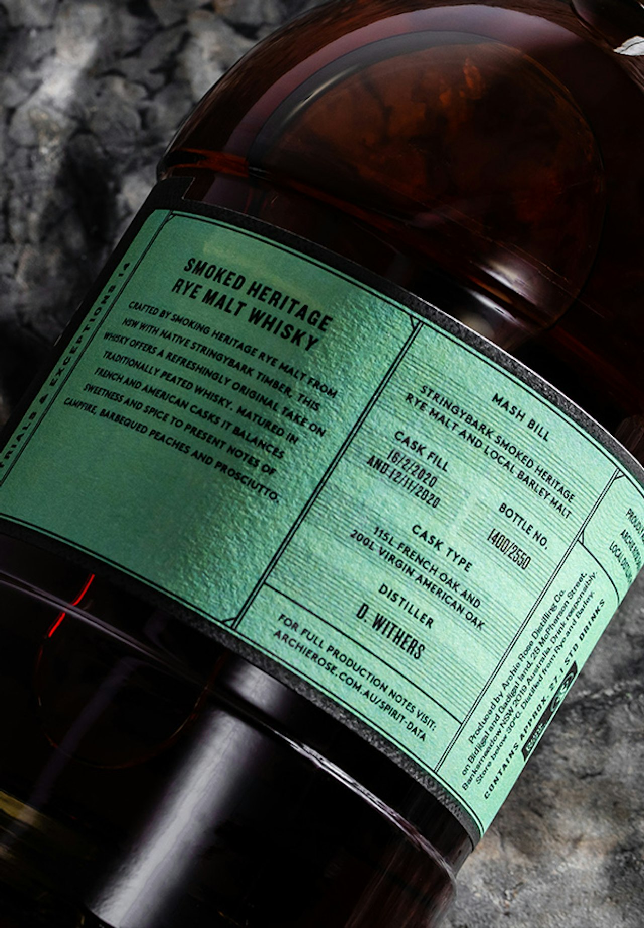 Overhead-view-of-back-of-Archie-Rose-Smoked-Heritage-Rye-Malt-Whisky-bottle