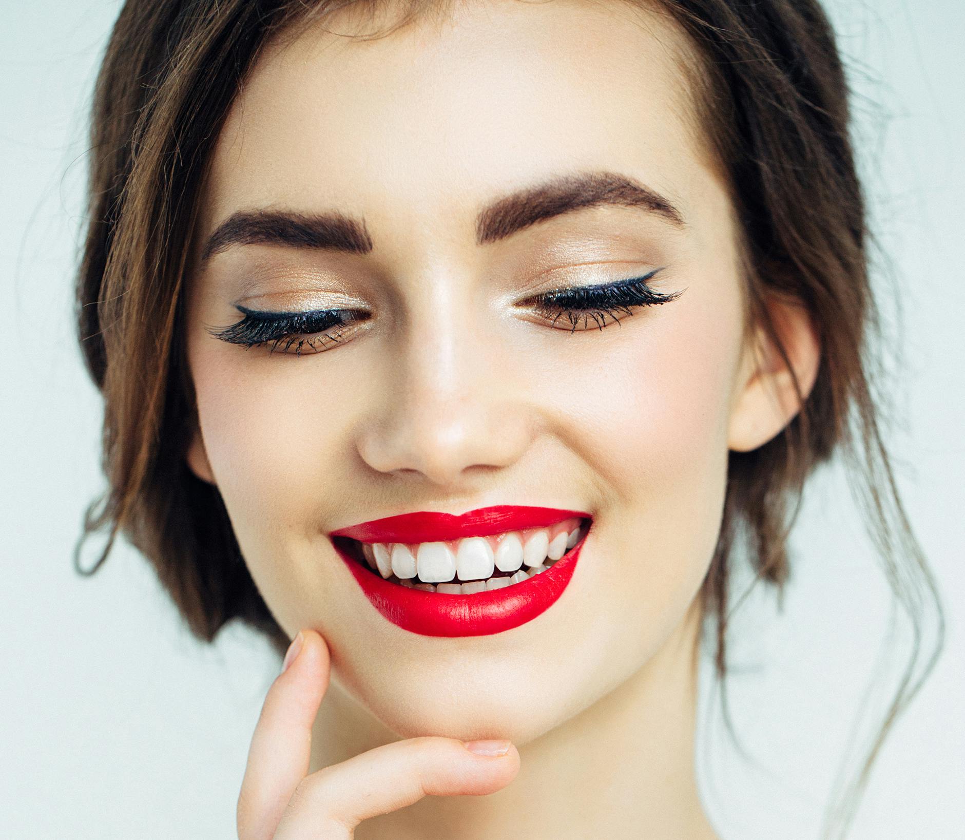 Woman wearing bright red lipstick