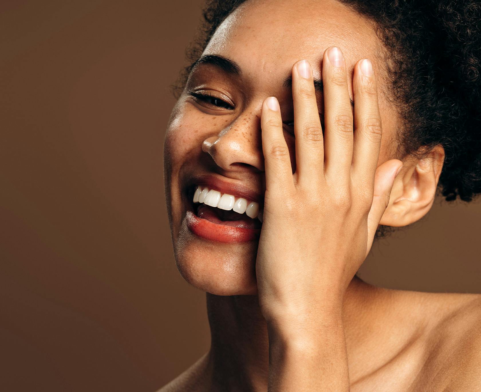 Woman with freckles smiling