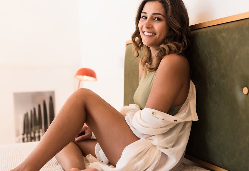 Woman showing her legs after laser vein removal in Tampa.