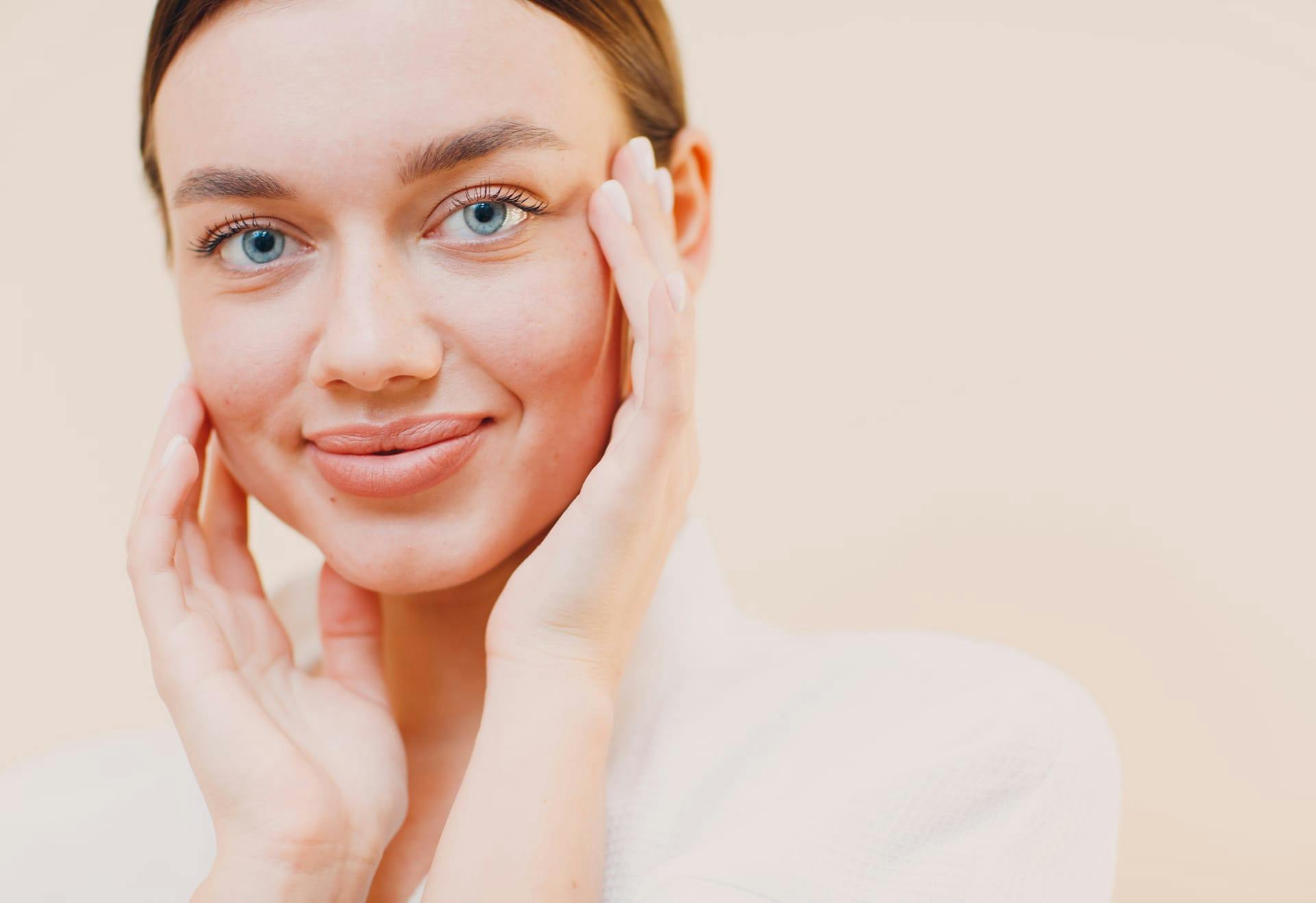 Woman with her hands on her face