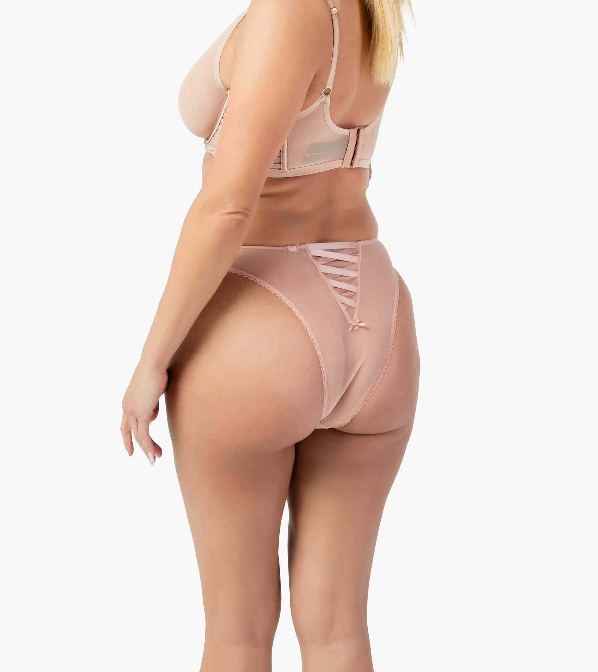 Photo of a woman posing in her underwear.