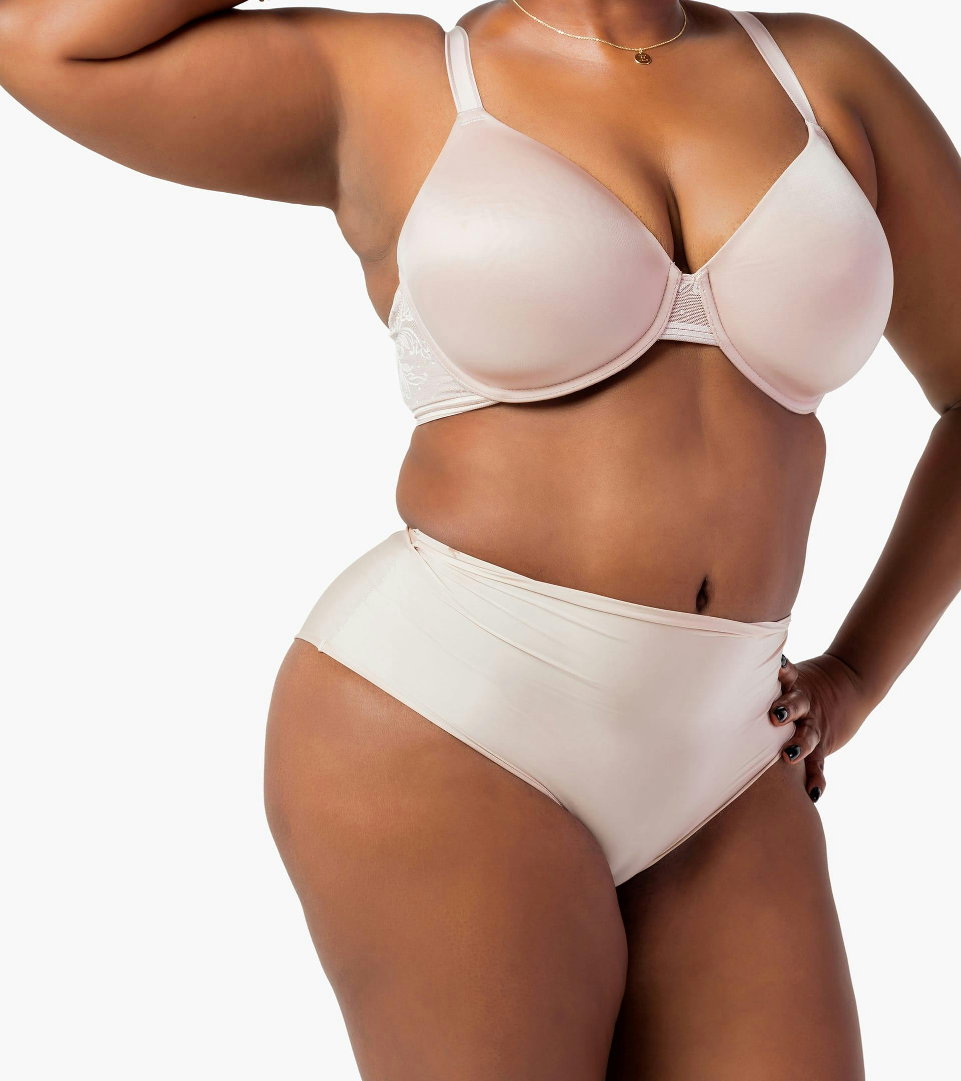 Woman posing in bra and panties.