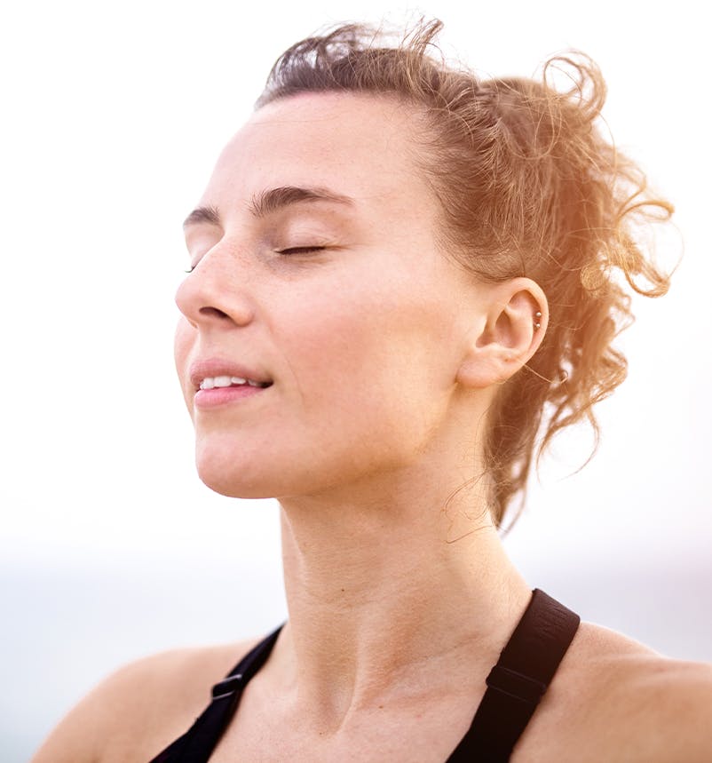 Woman smiling in the sun