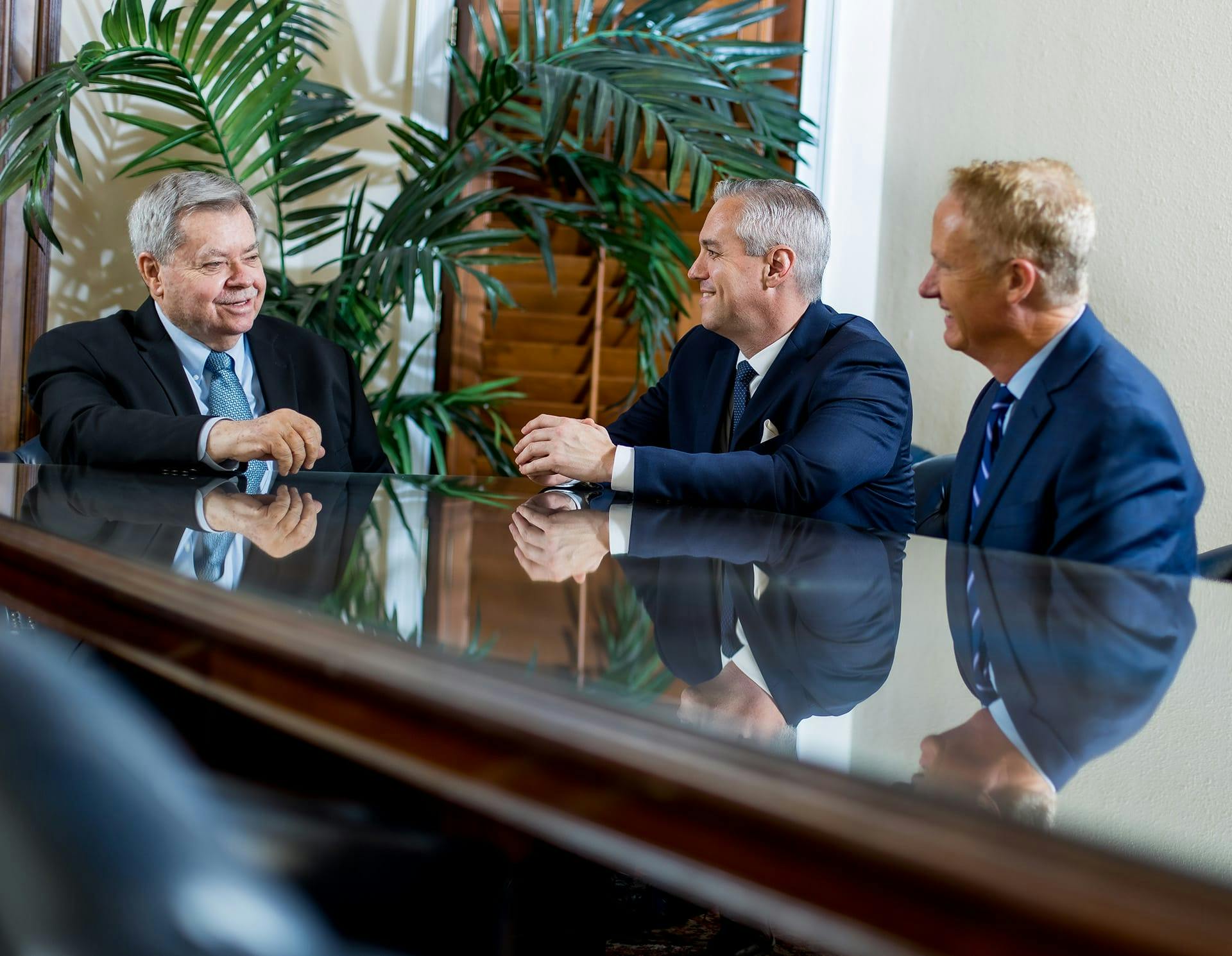 Attorneys from Carlson, Meissner & Hayslett P.A. at conference table