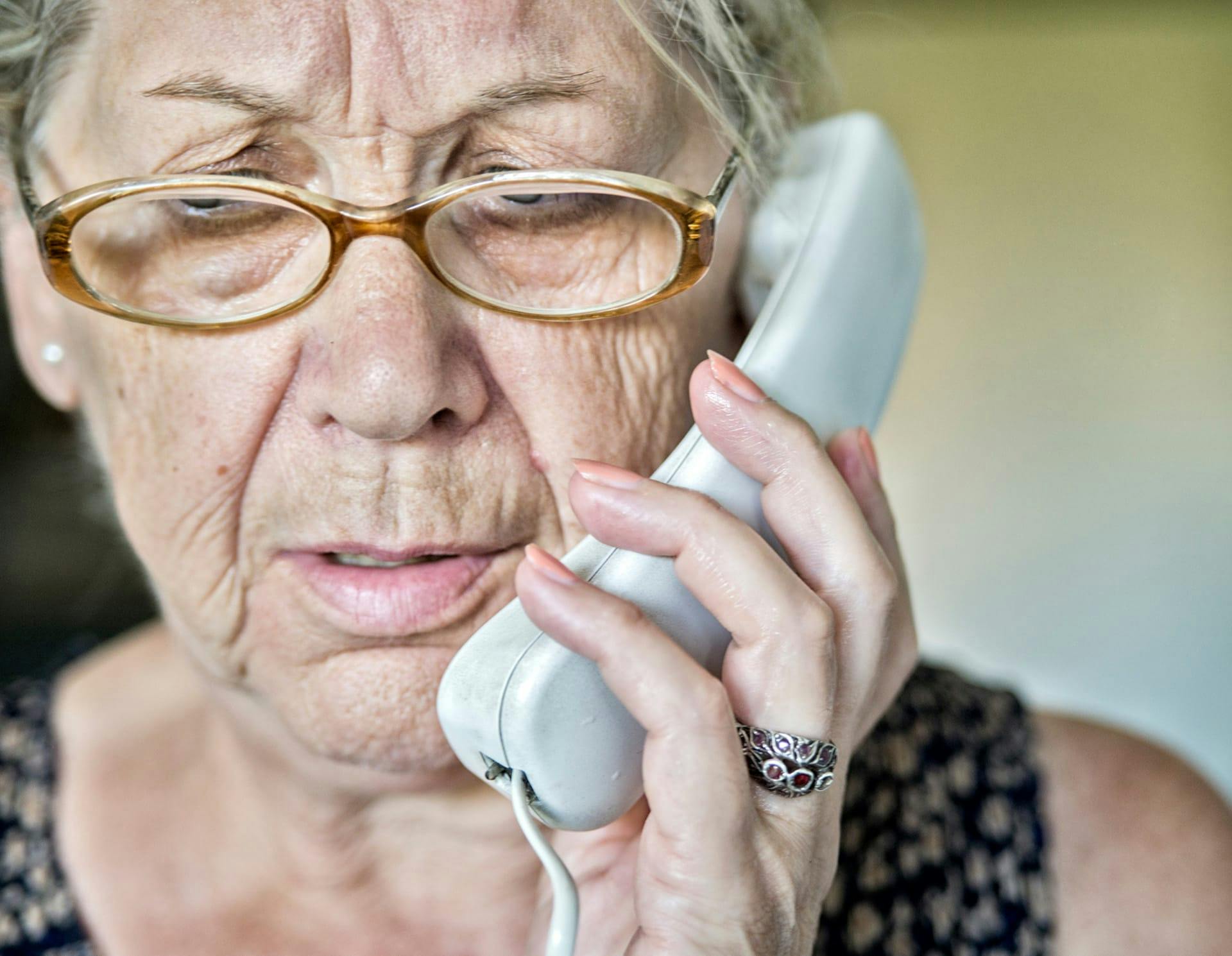 Elderly woman on phone
