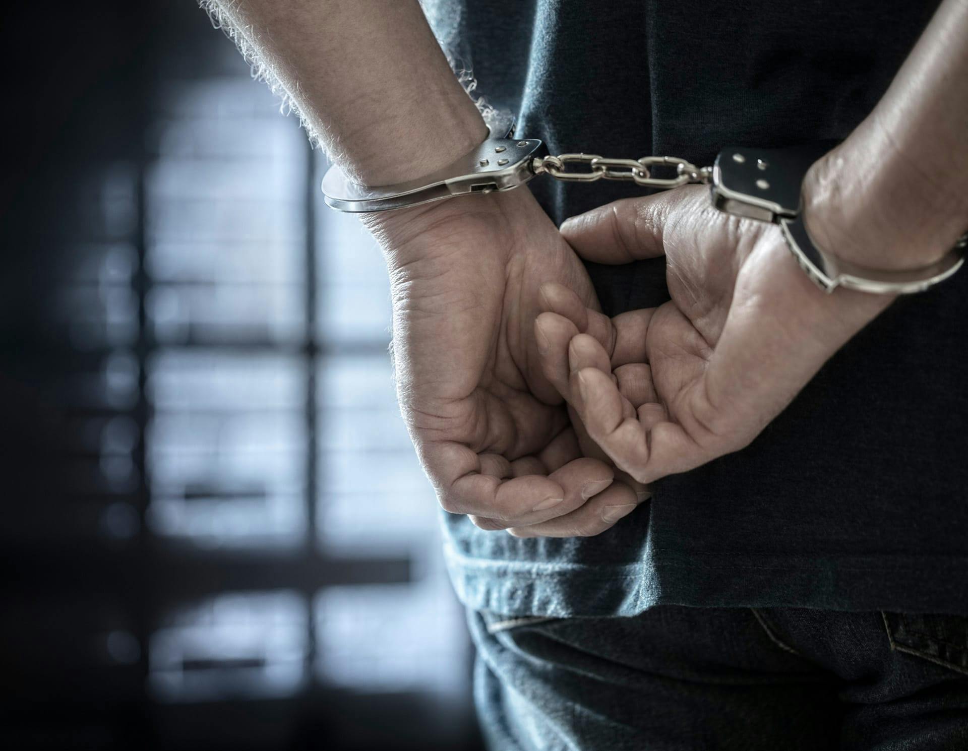 Person in handcuffs