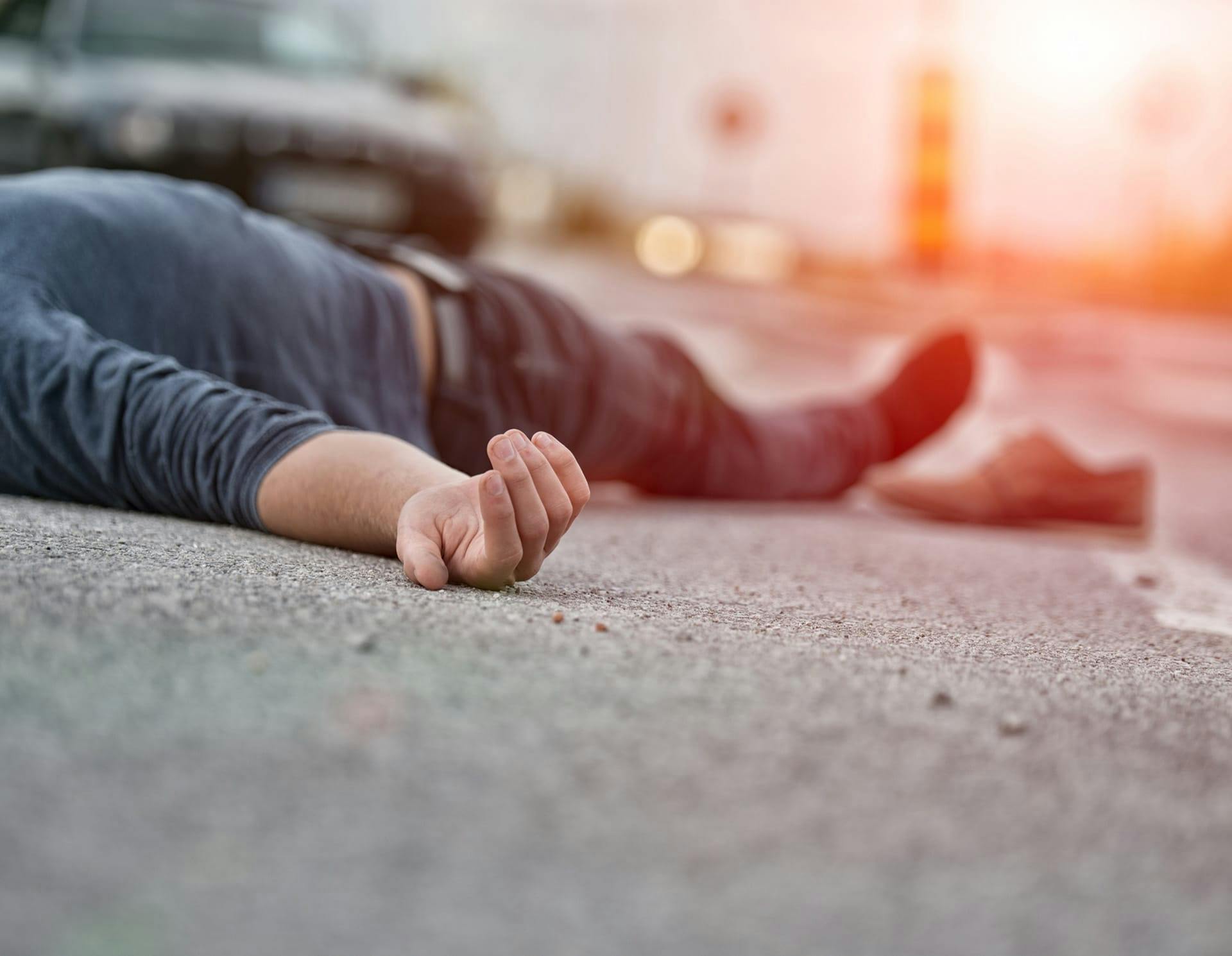 Injured person laying on the ground