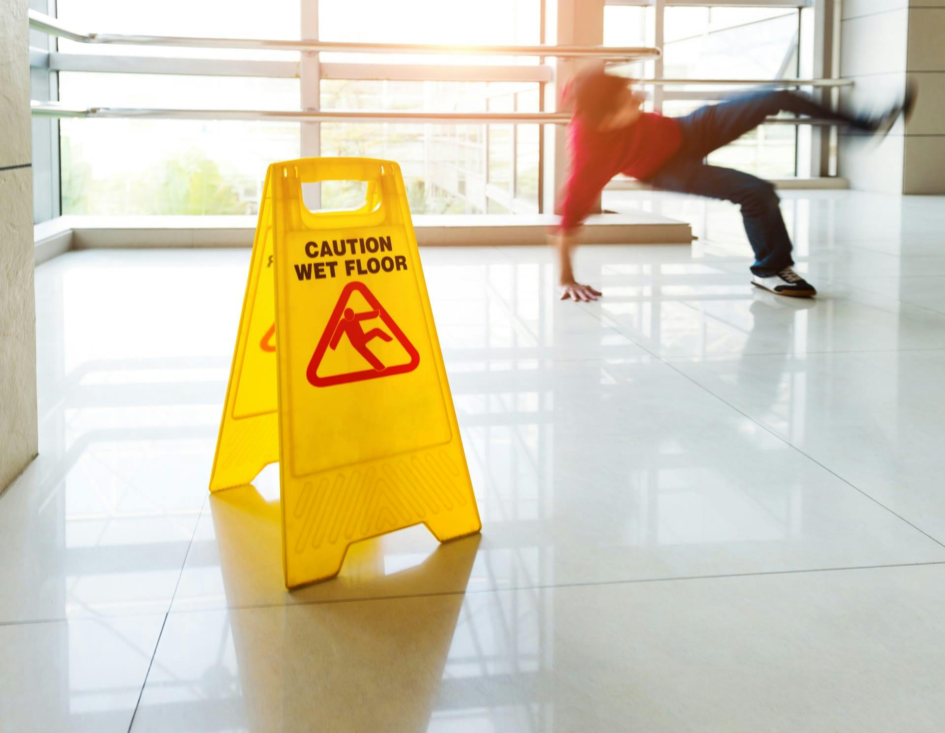 Person slipping on wet floor