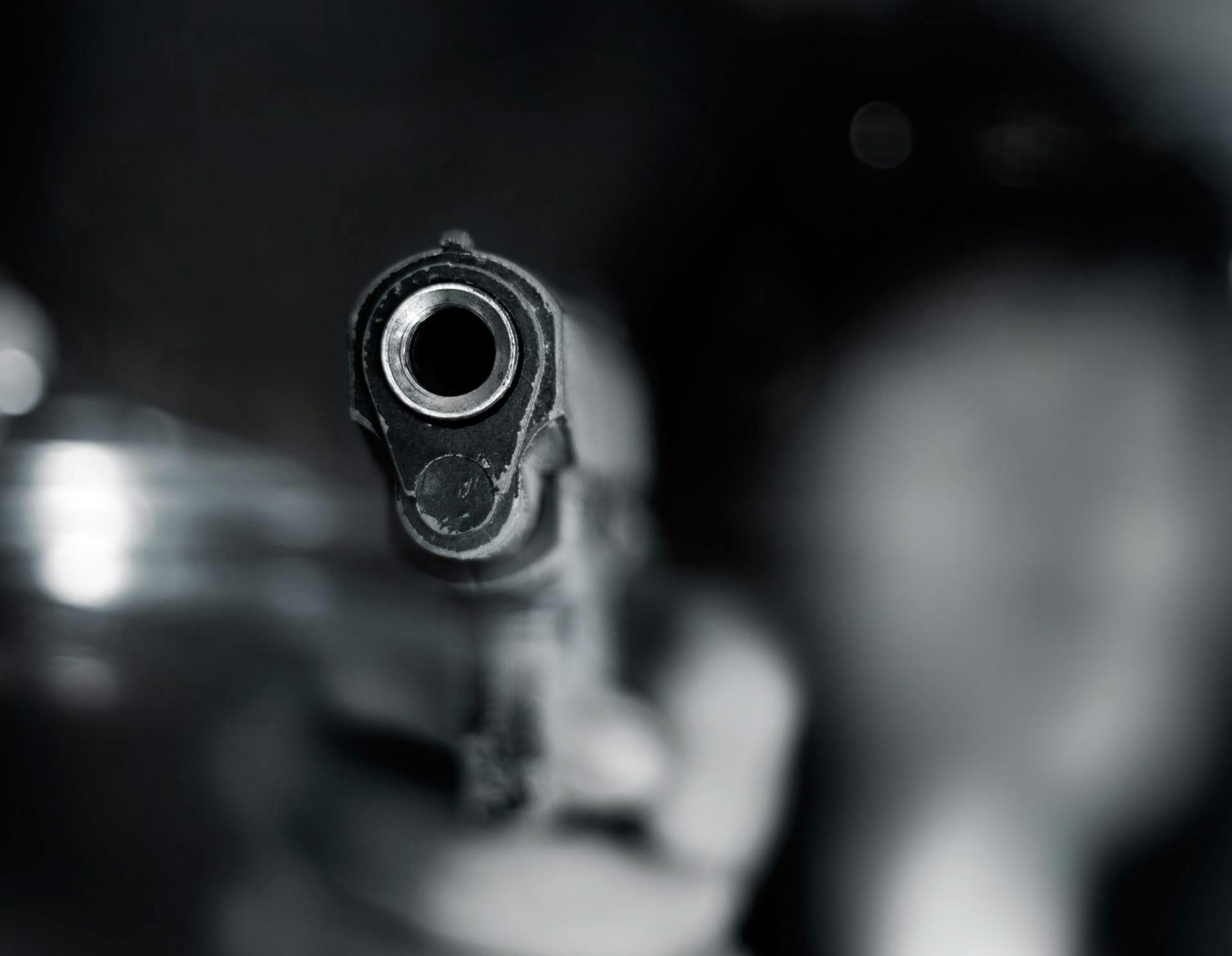 Person holding gun