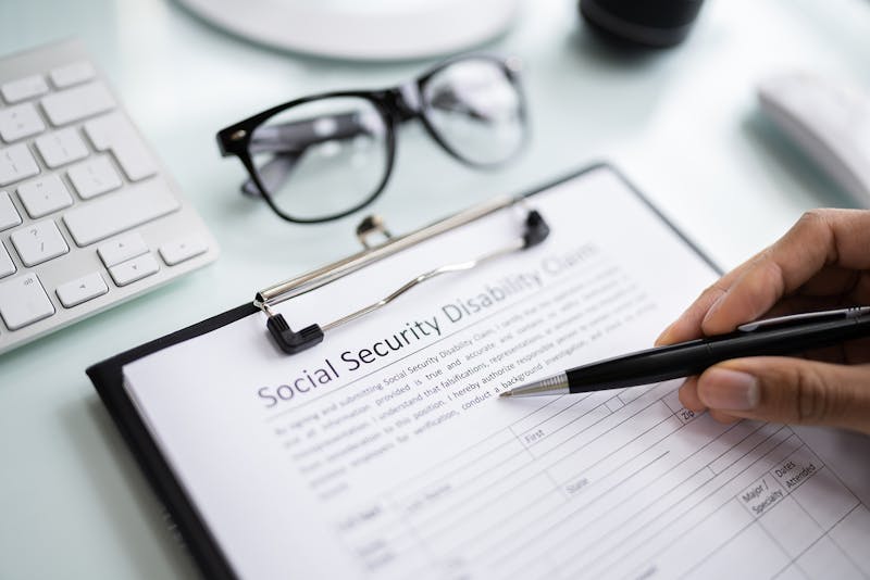 Person reviewing social security disability claim.