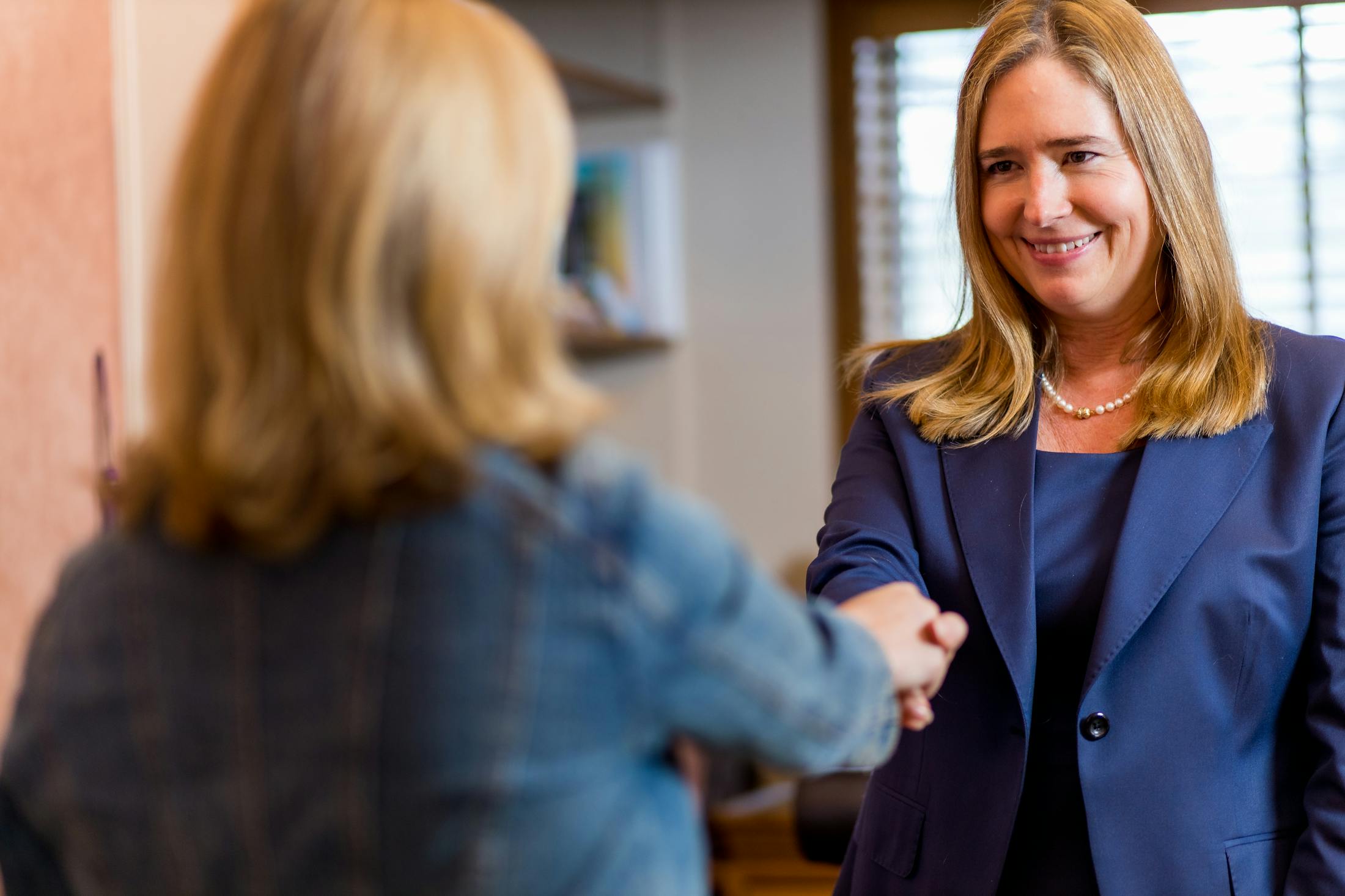 Woman shaking hands