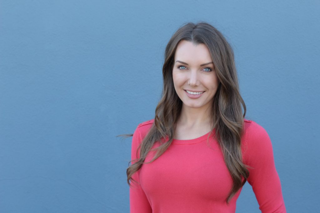 Woman in a long sleeve red top