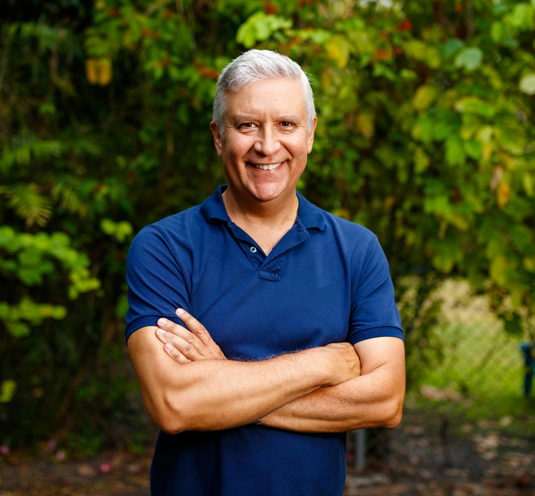 A man standing with his arms crossed