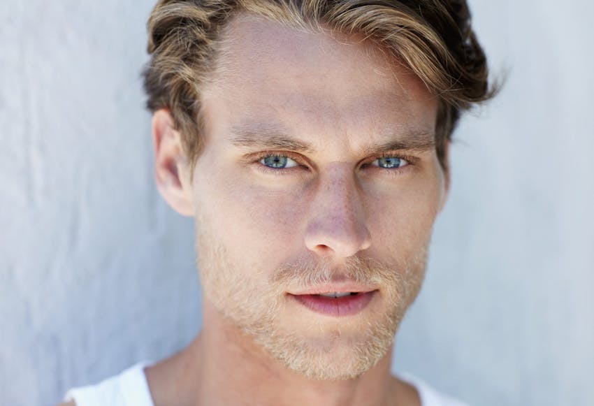 Man with blue eyes and blonde hair