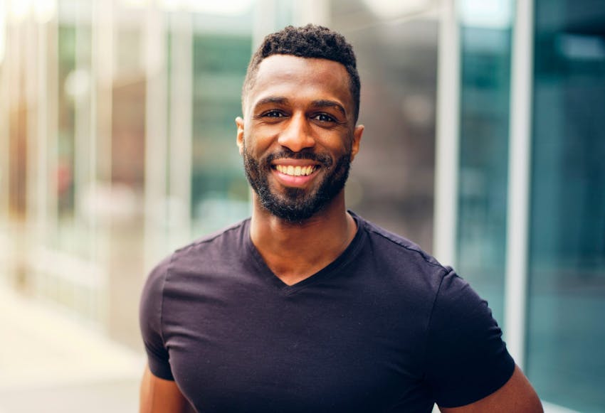 Handsome man with facial hair smiling
