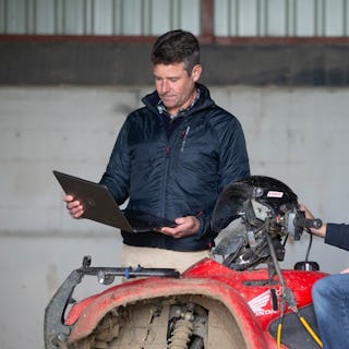 adult, male, man, person, pants, helmet, portrait, laptop, hardhat, motorcycle